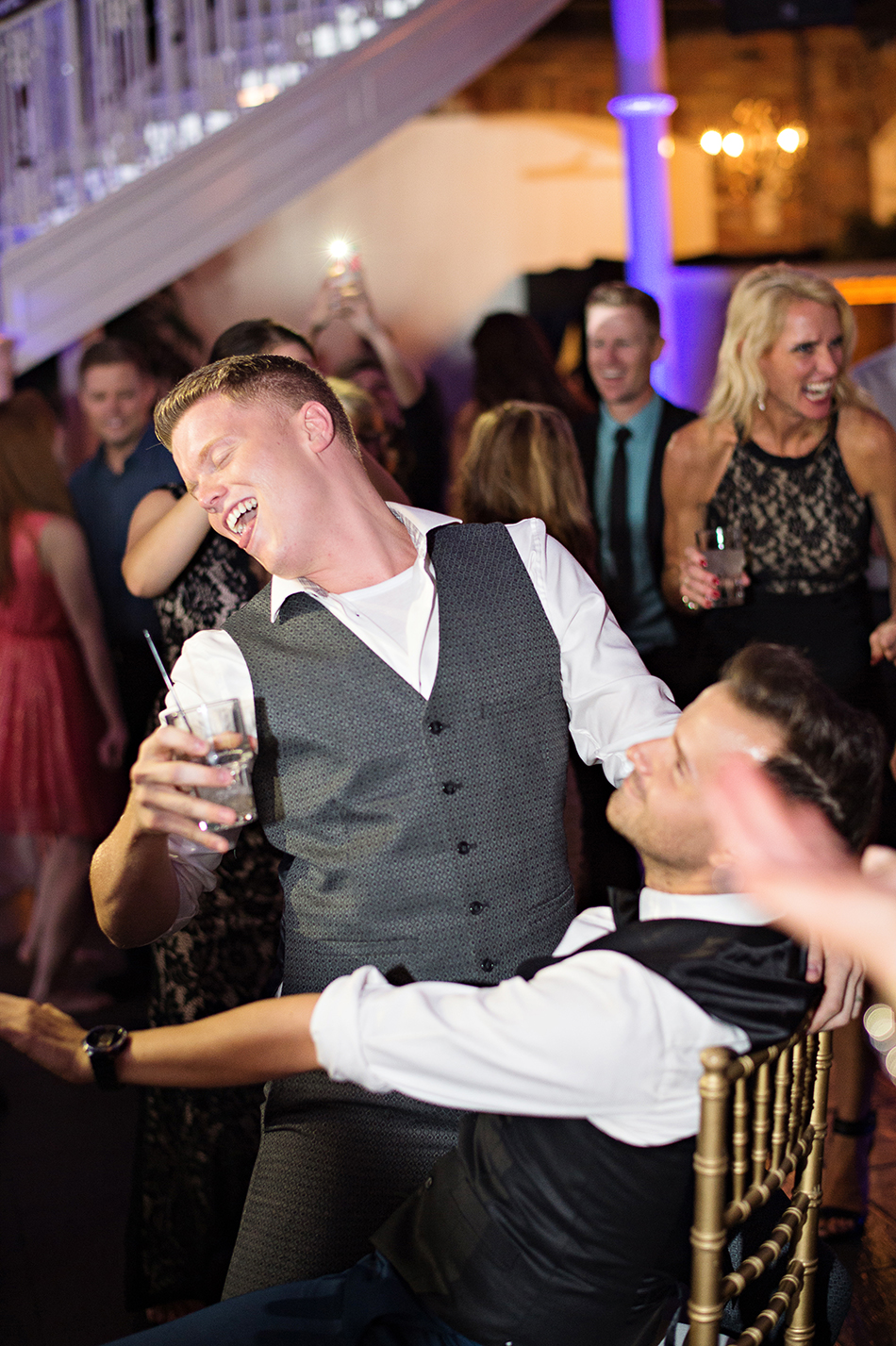 grooms dancing reception
