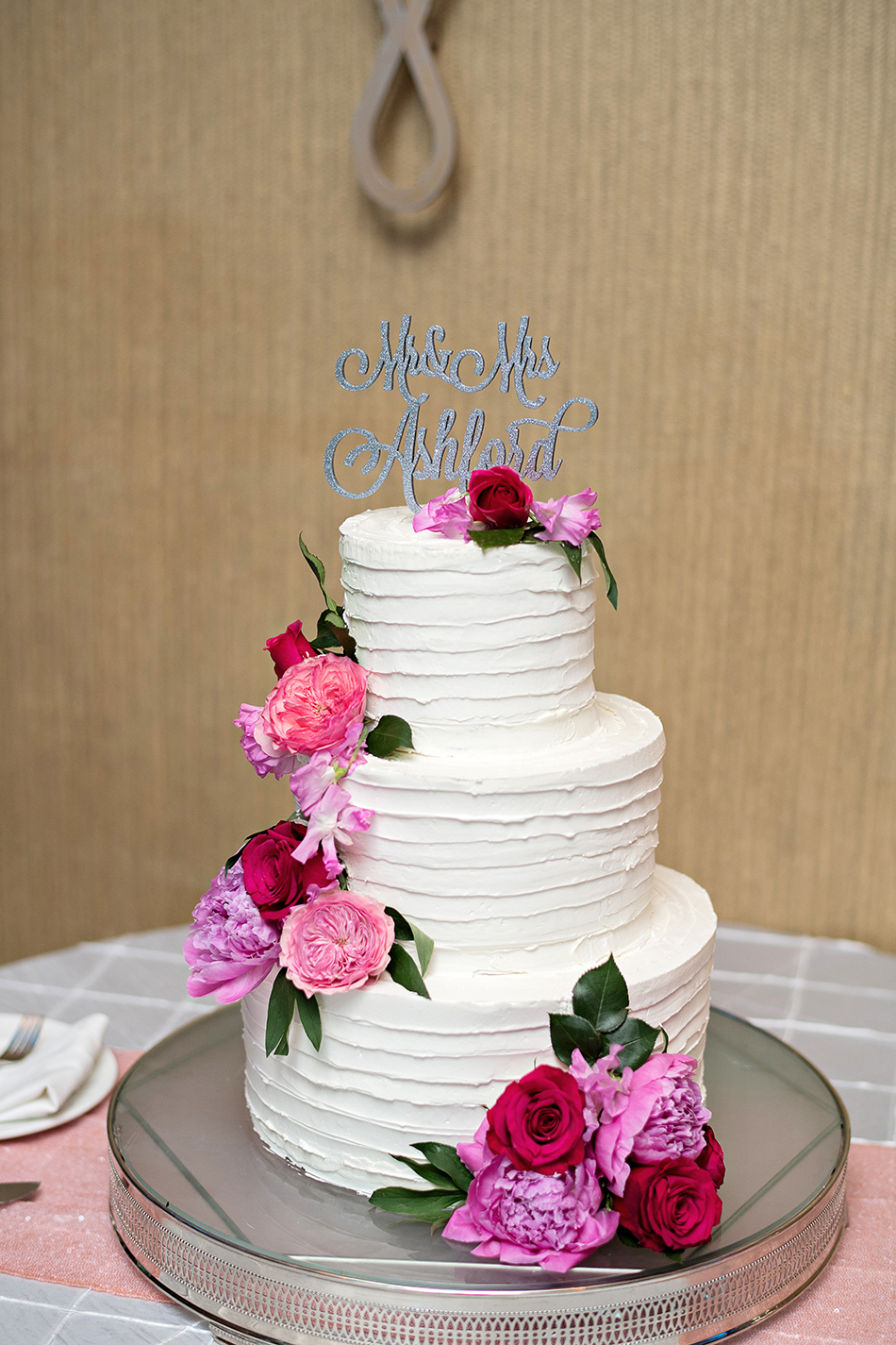simple pink and white wedding cake