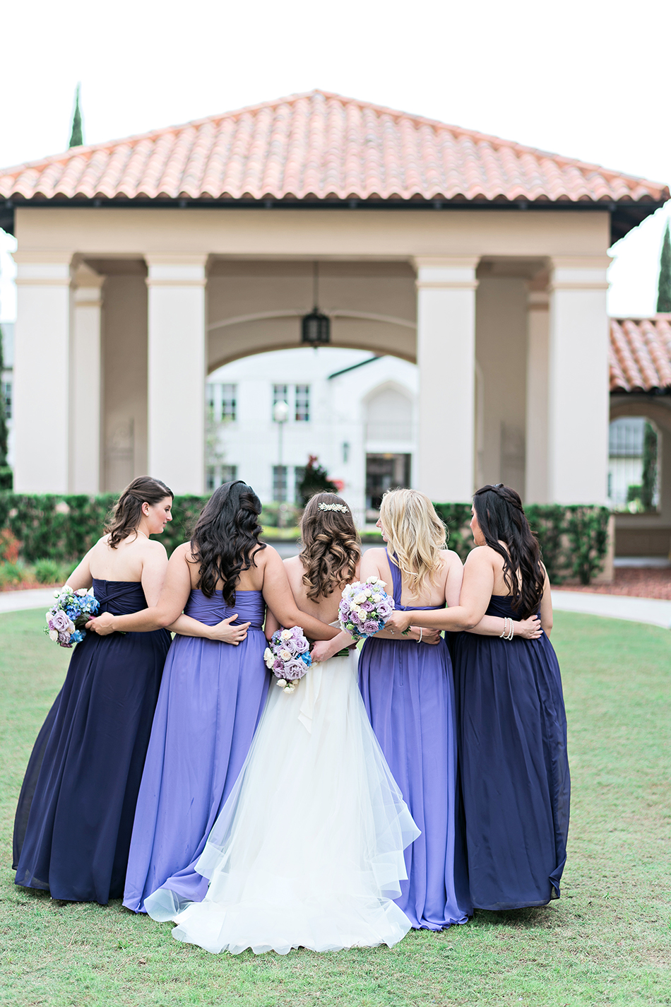 lavender and purple bridesmaid gowns