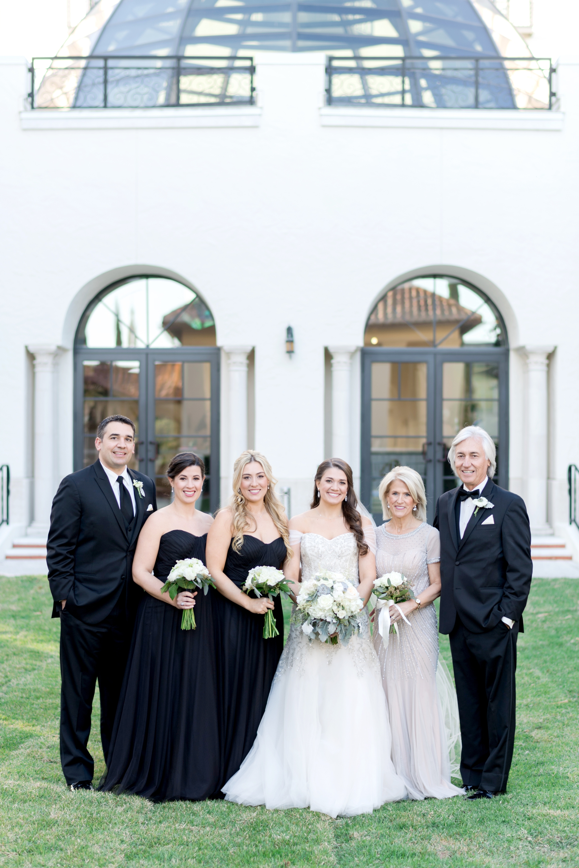 family formal photograph at wedding