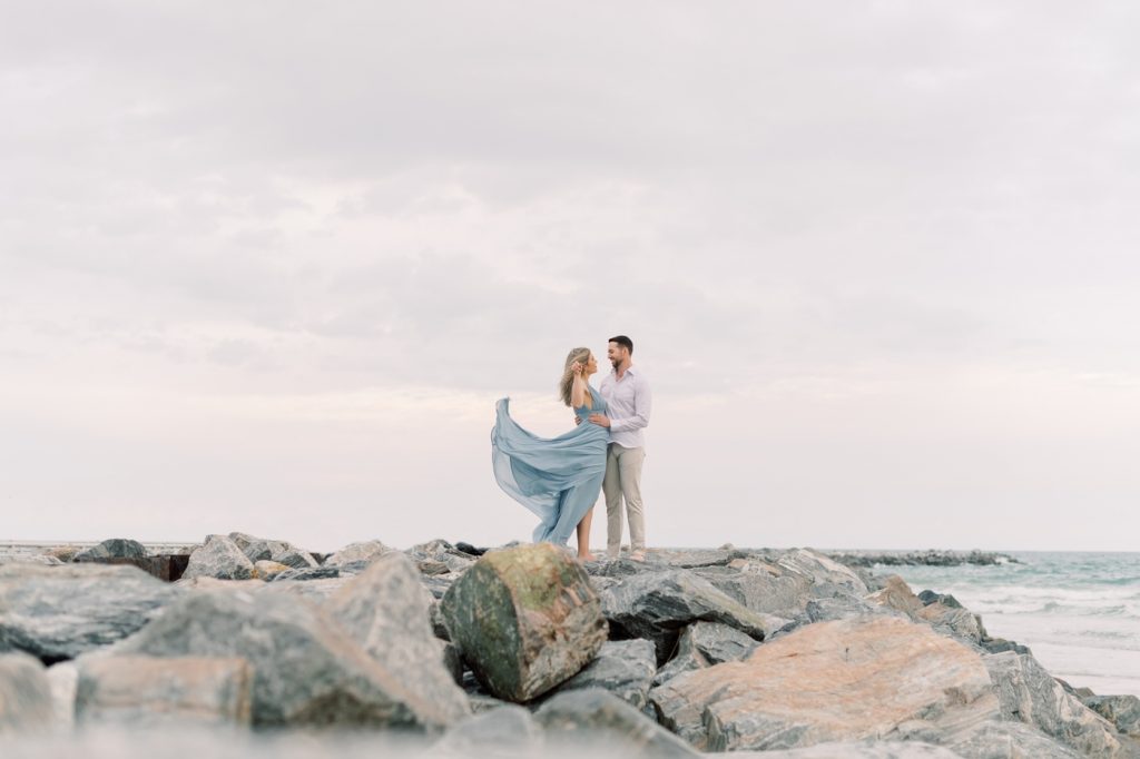 A Beach Engagement Session With A Touch of Wind