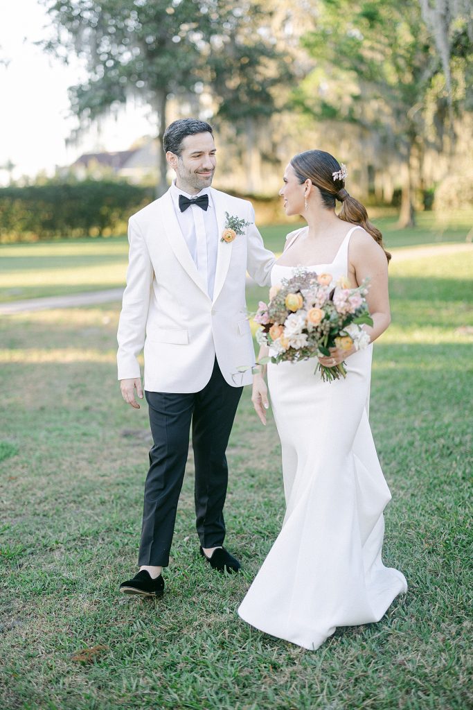 Ines Di Santos wedding dress with colorful bouquet