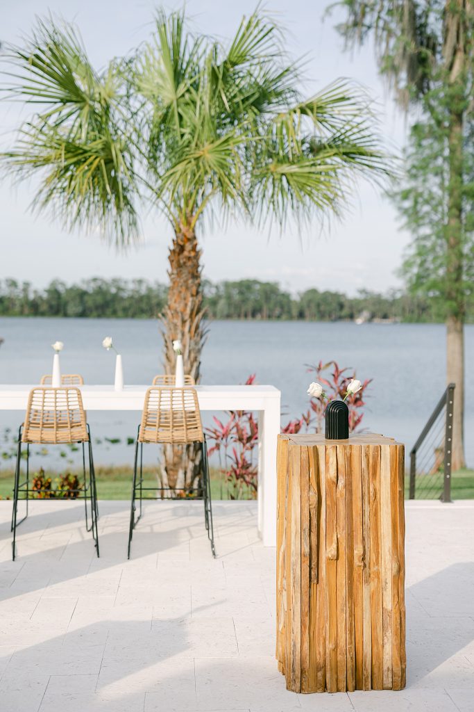 wooden cocktail tables with lake view
