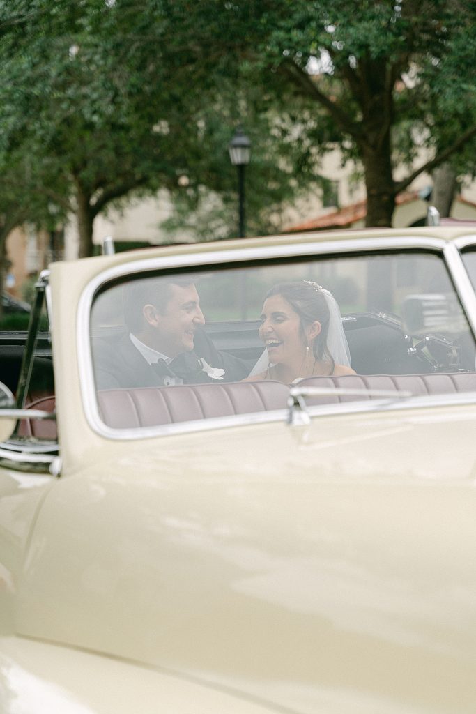 bride and groom getaway car