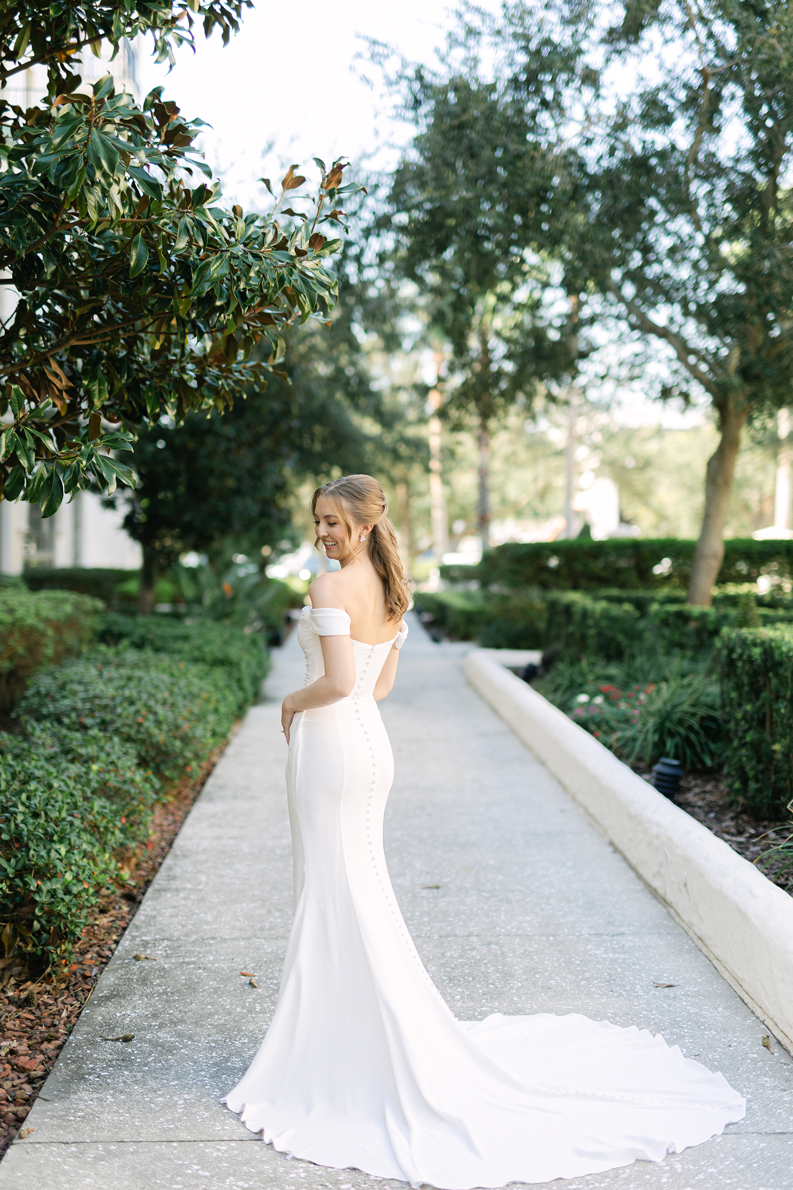 elegant mermaid wedding dress outside of St. James Cathedral