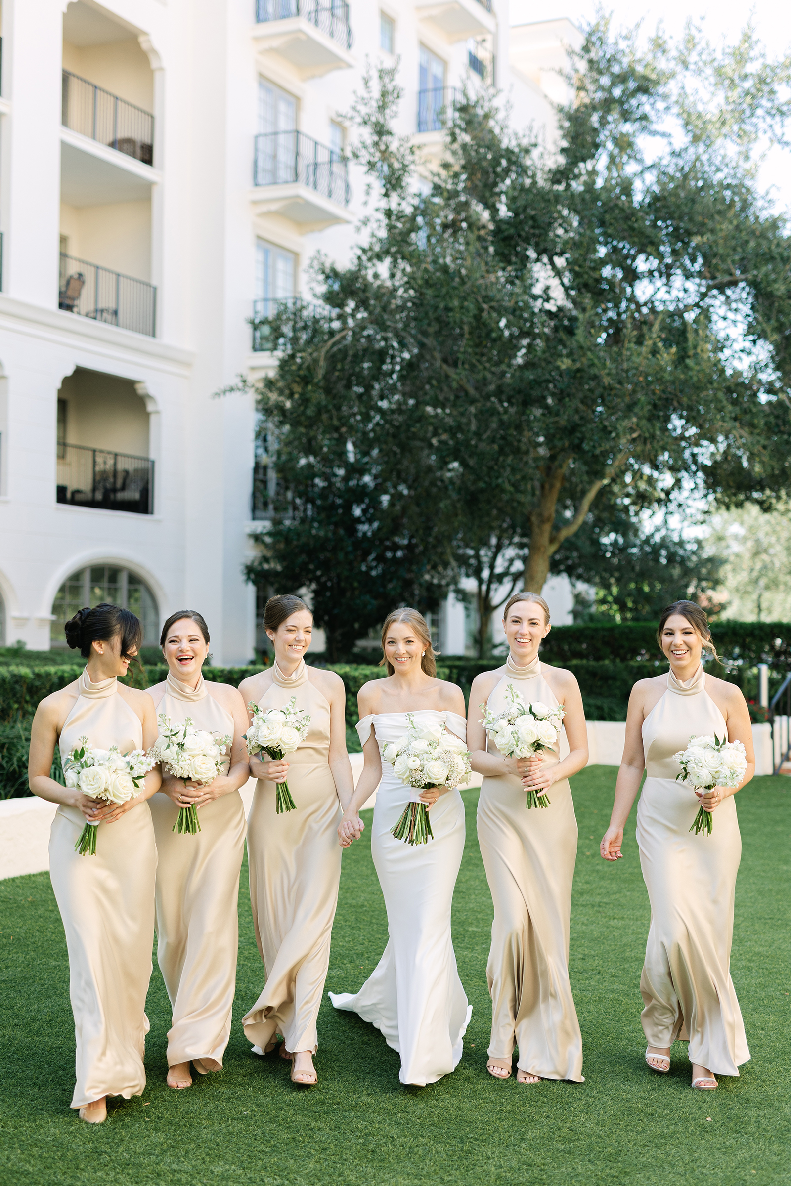 white and champagne bride and bridesmaids' dresses