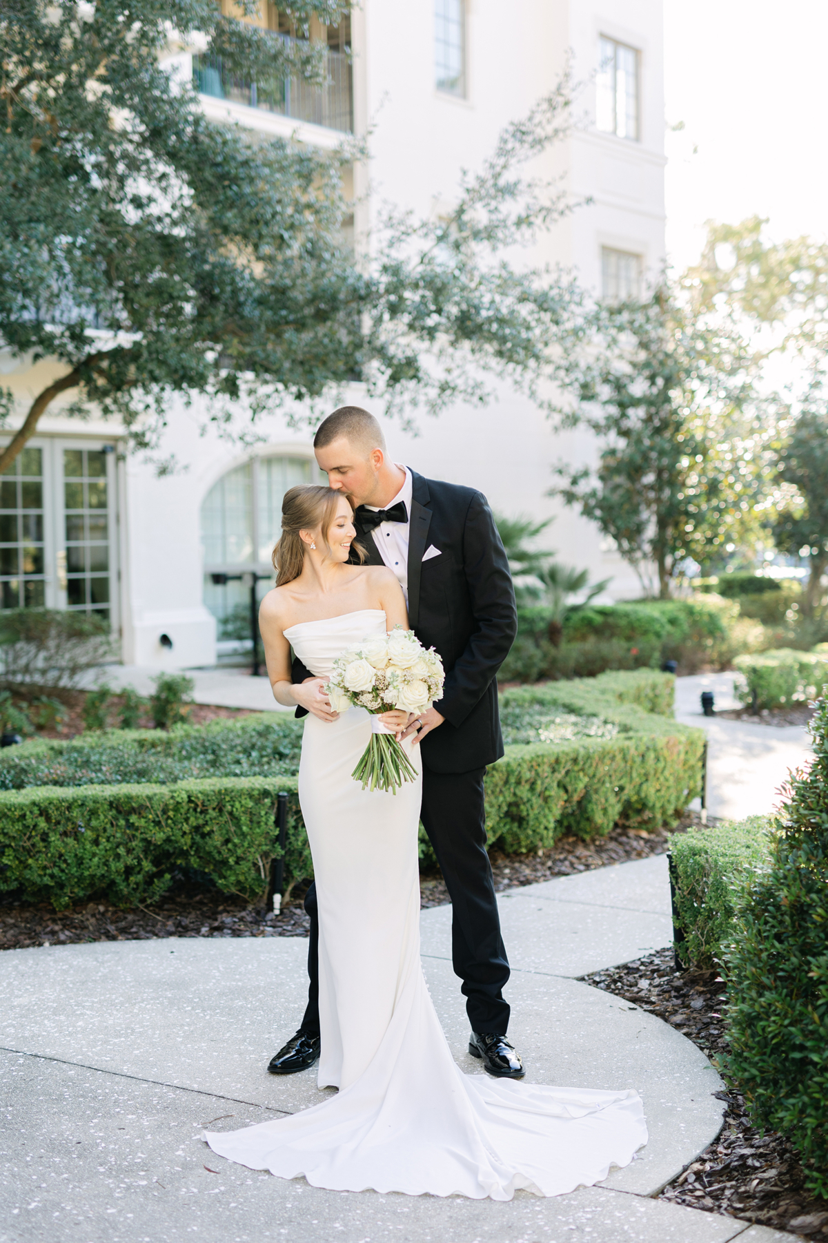 bright outdoor portraits of bride and groom at St. James Cathedral