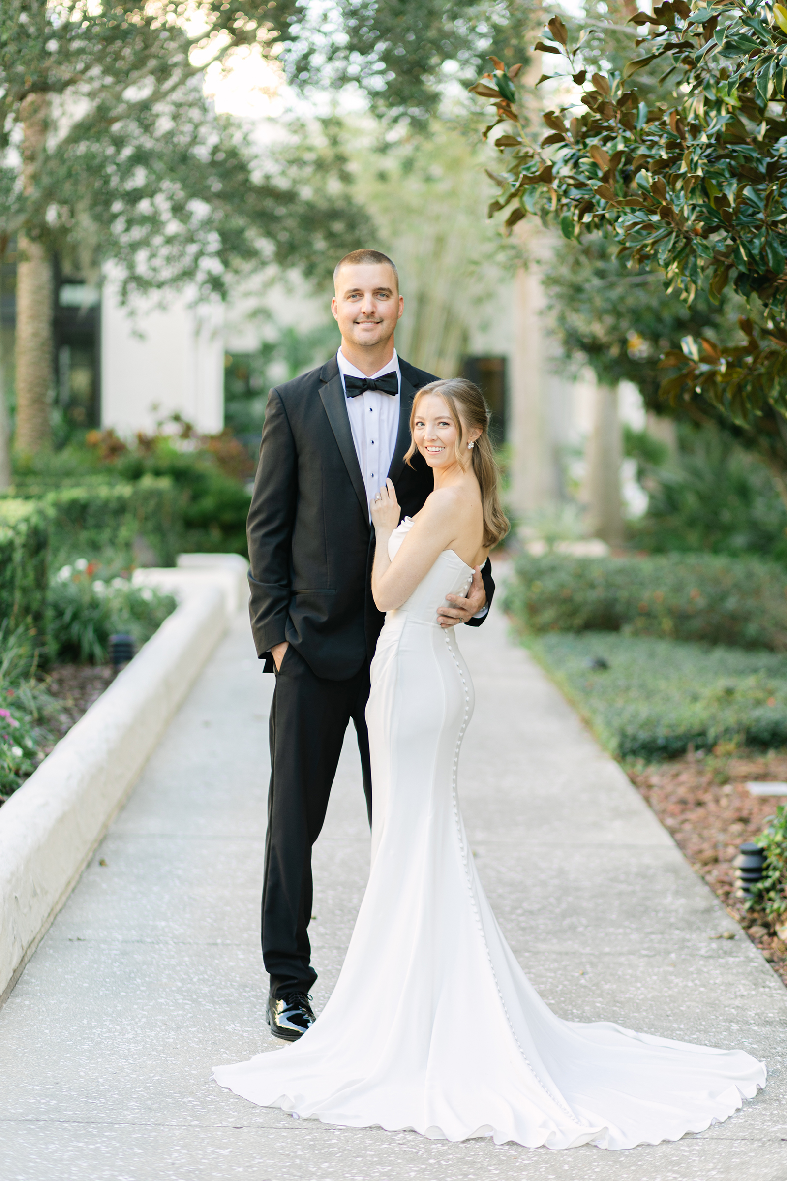 bright outdoor portraits of bride and groom at St. James Cathedral