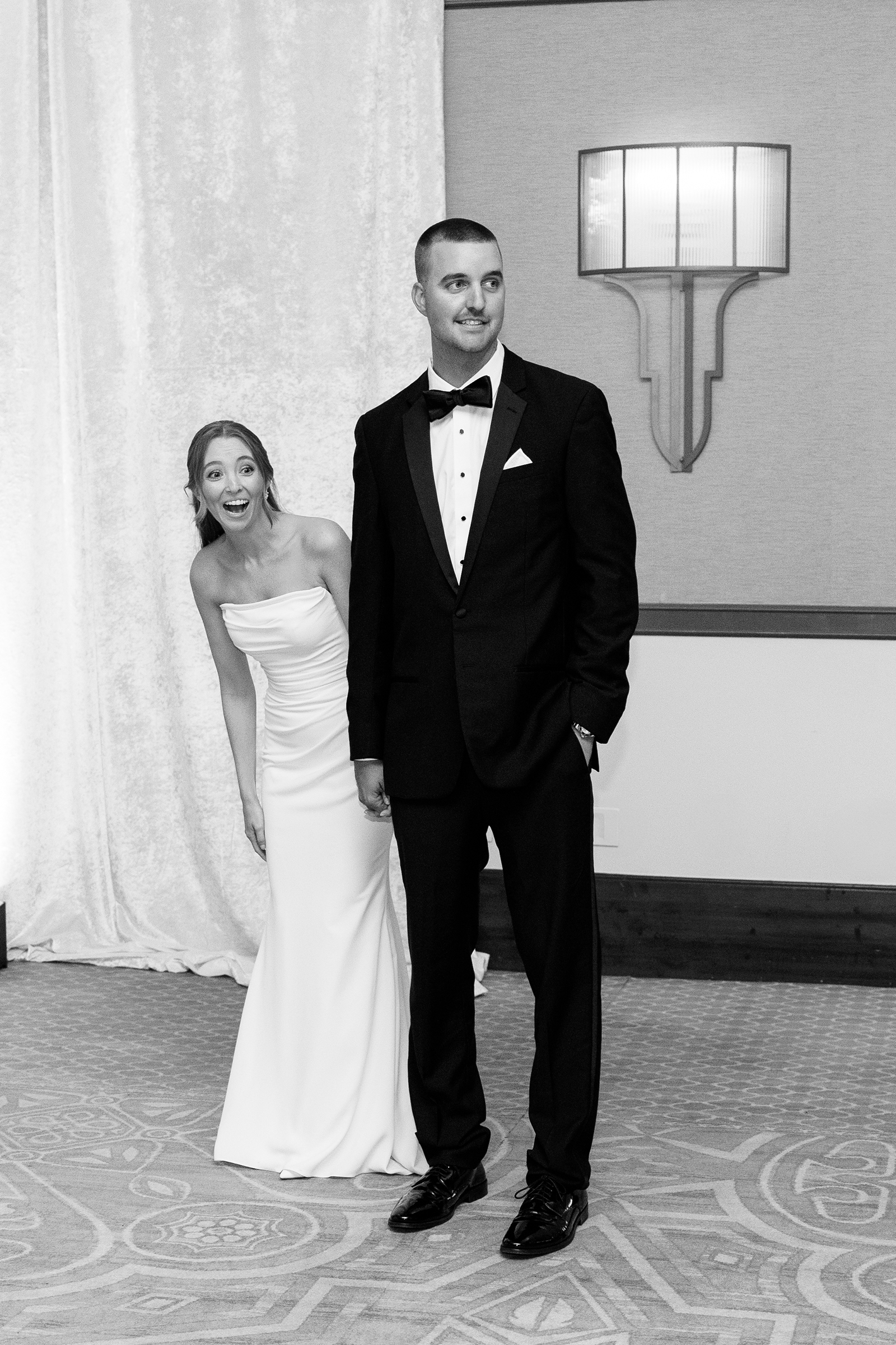 black and white portrait of bride and groom at reception