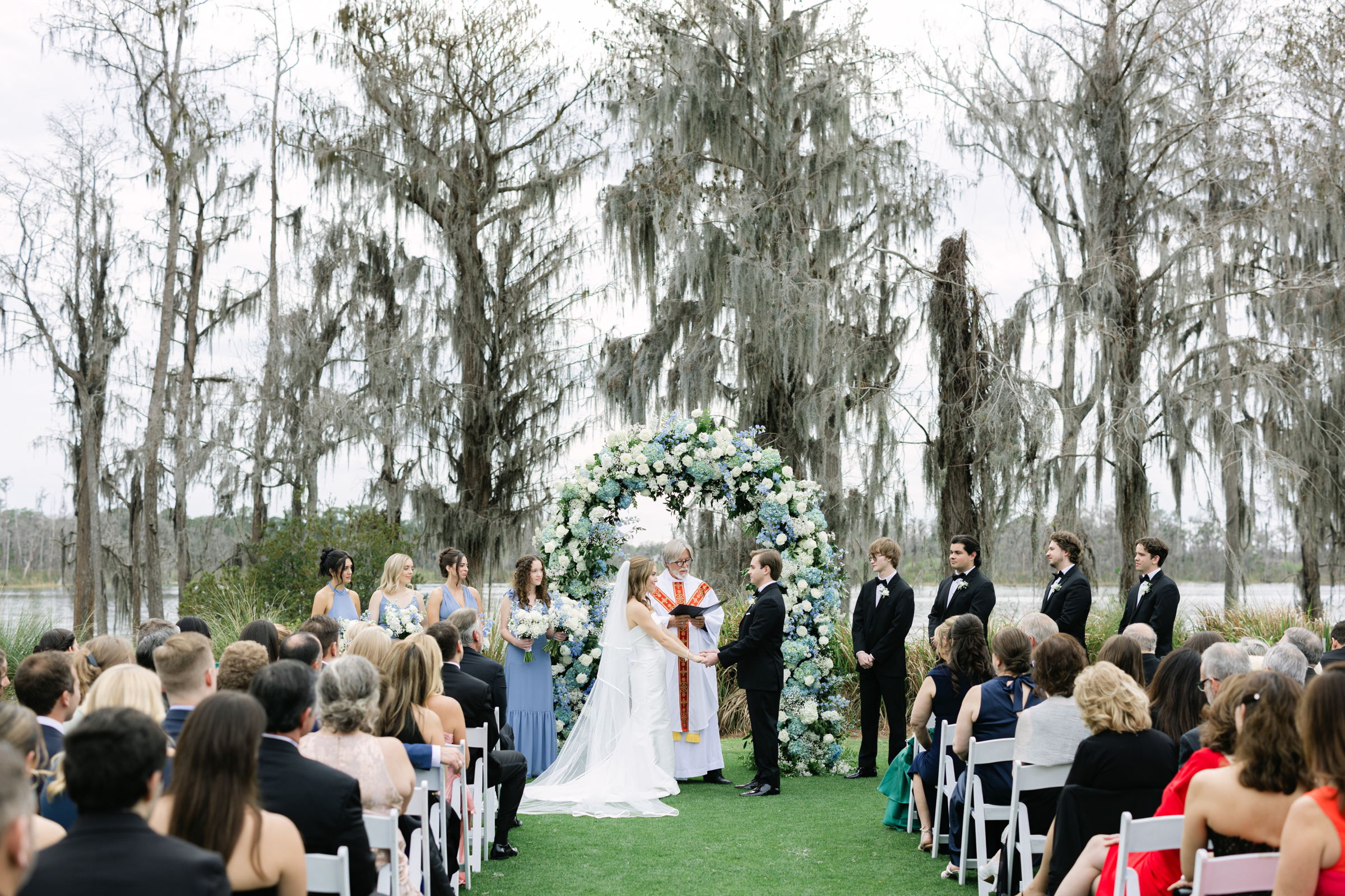 bride and groom at alter