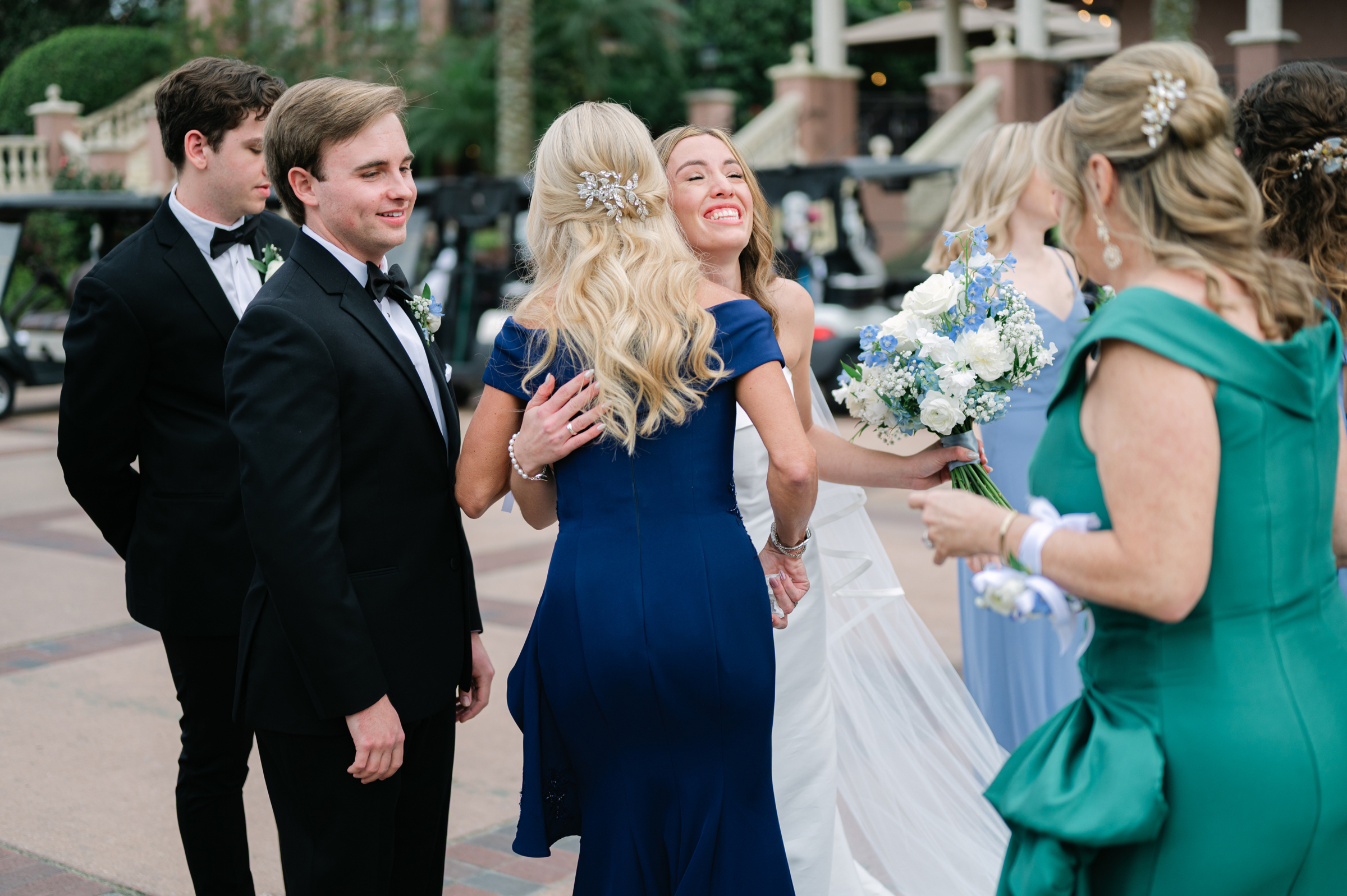 bride greeting wedding guests