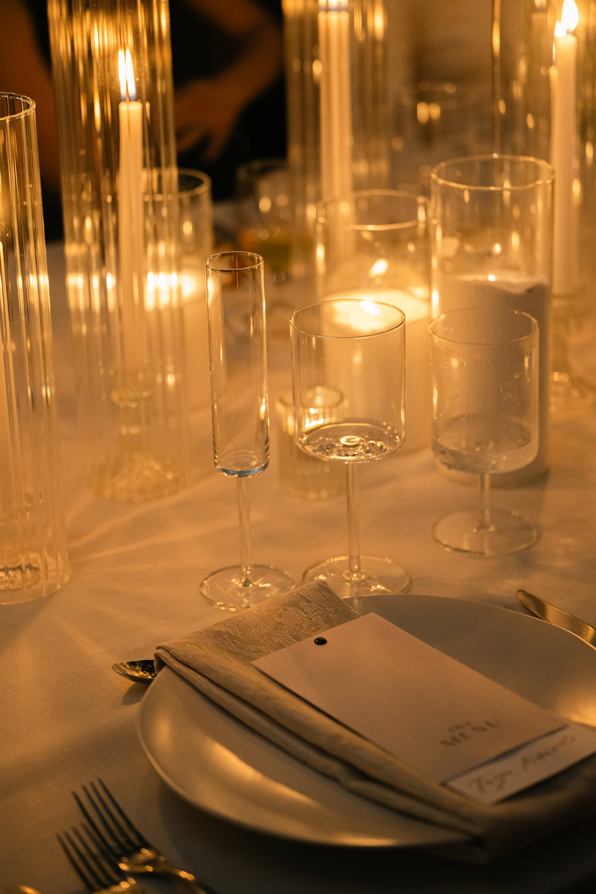 Elegant wedding reception at Isleworth Country Club designed by Taylored Affairs Wedding Planning with ceiling draping