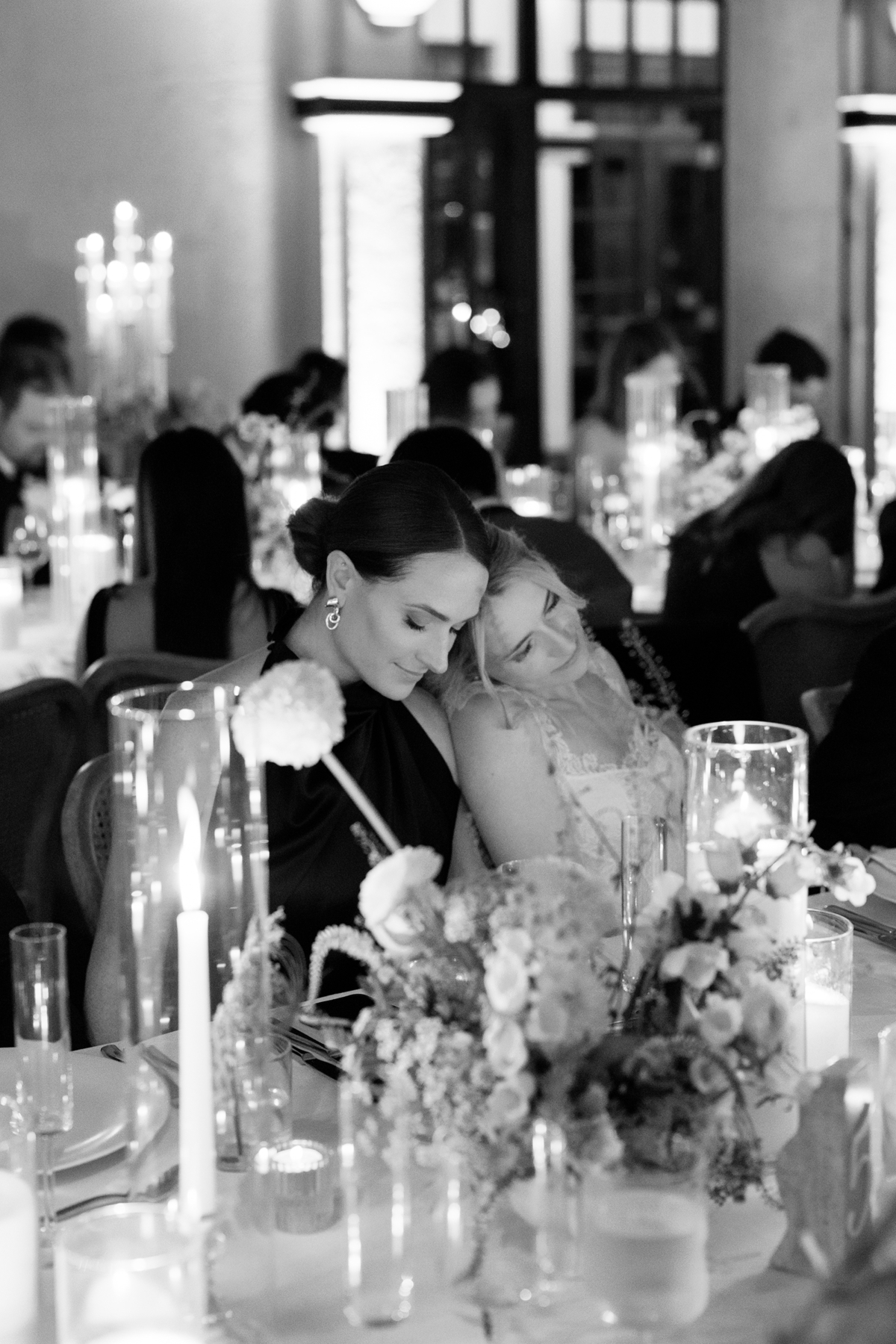 Elegant guest table design with organic florals and candlelight at Isleworth Country Club wedding