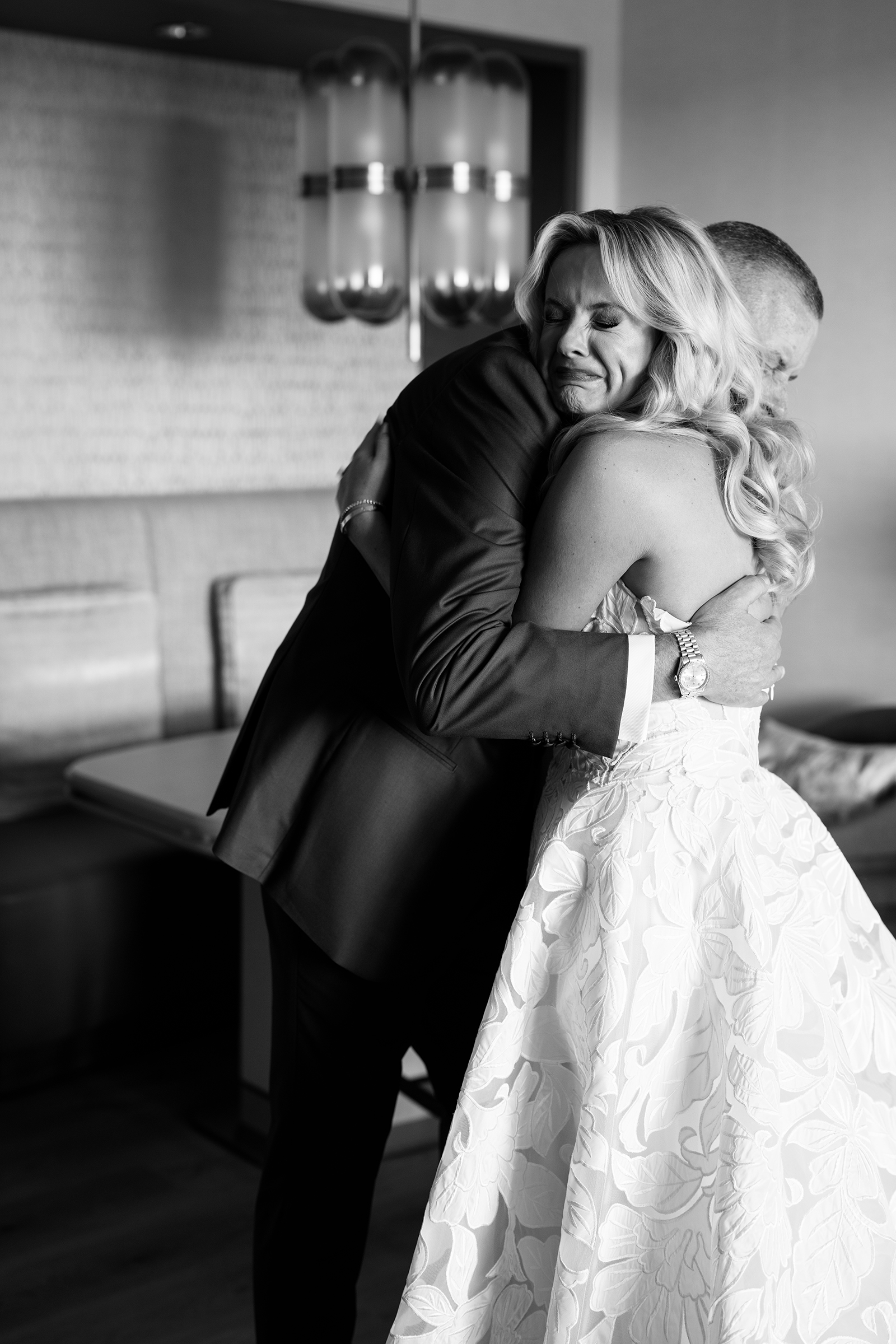 black and white picture of bride's first look with dad