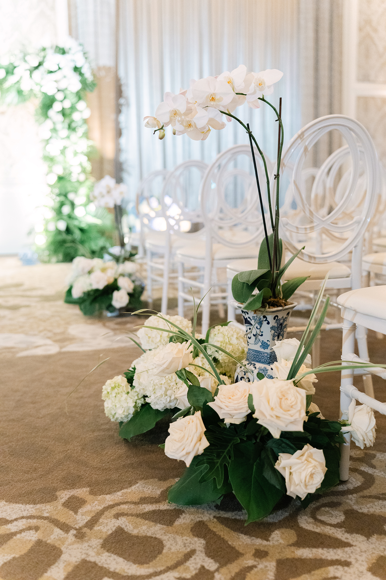 orchids and roses for wedding ceremony