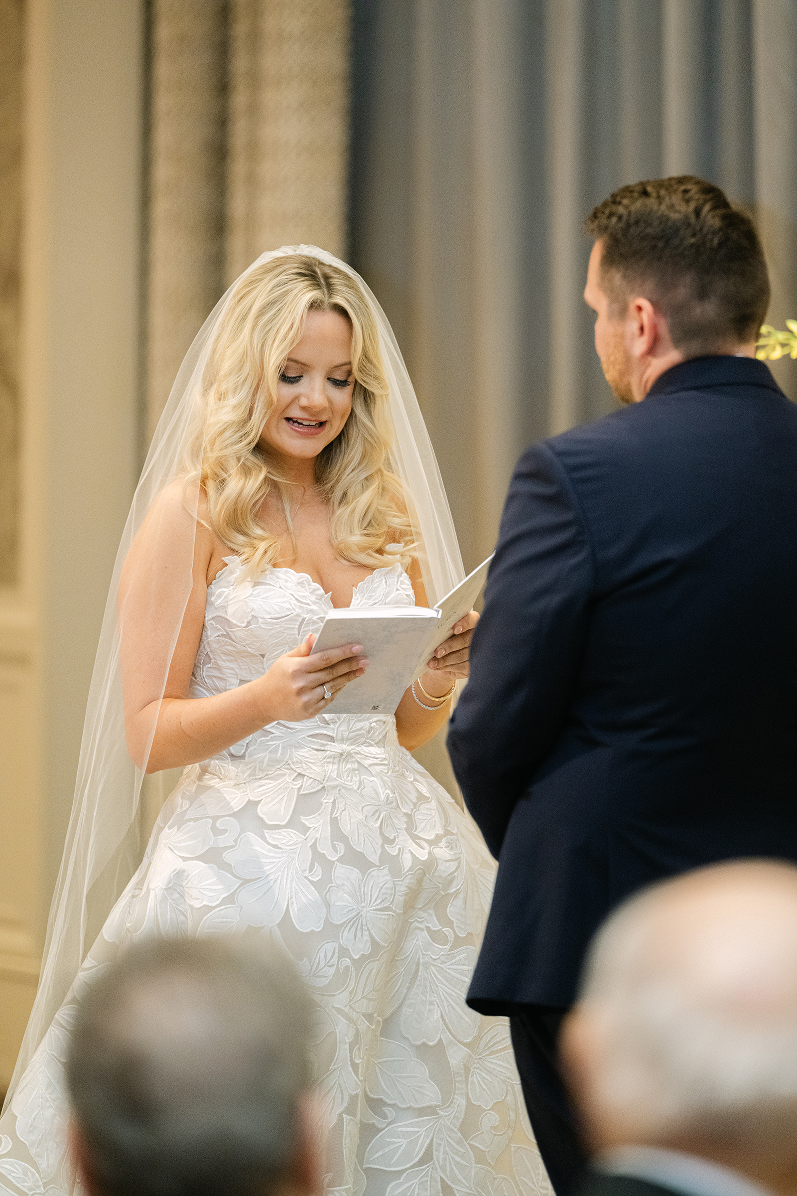bride saying vows at aisle