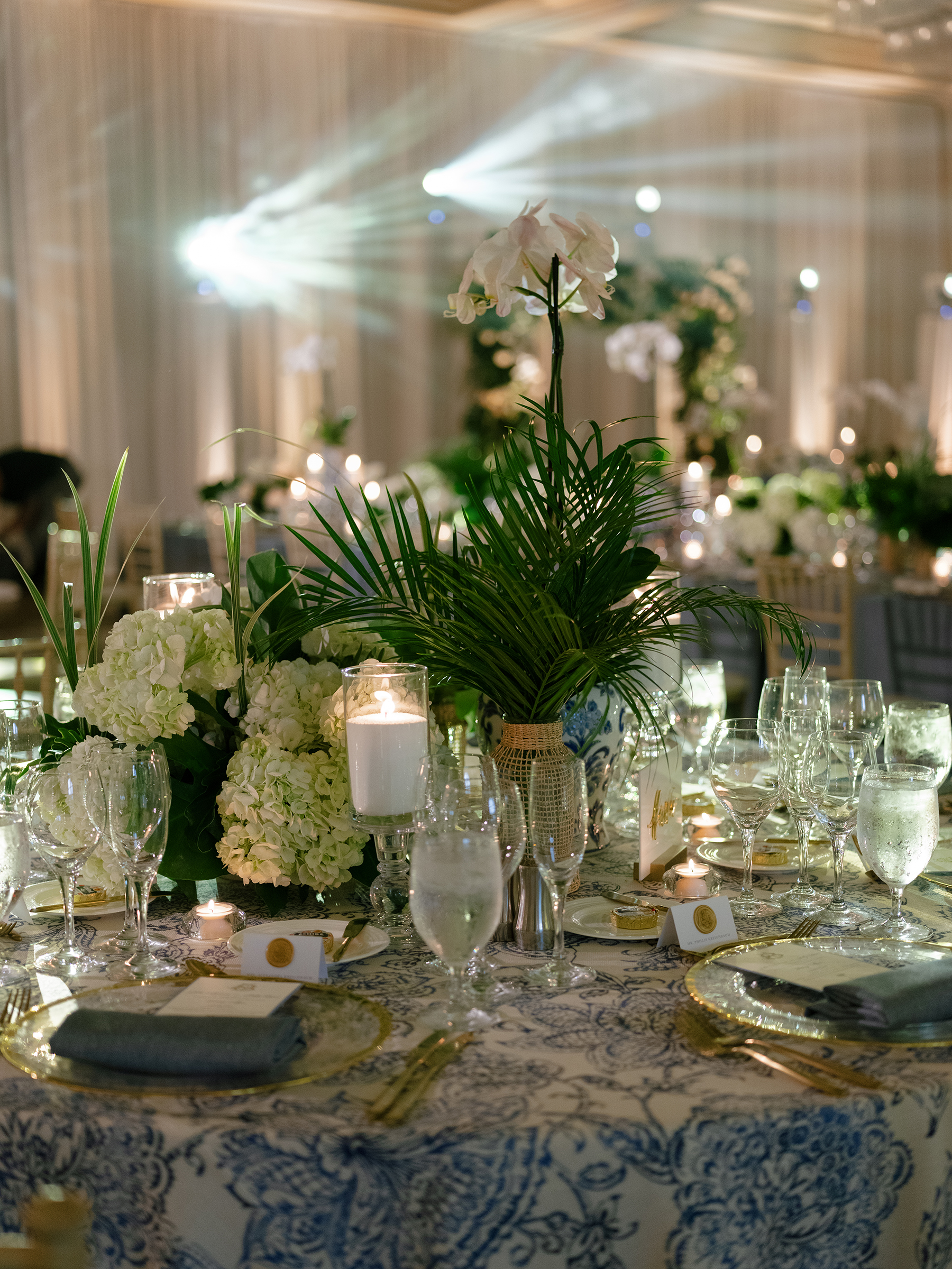 tropical and elegant tablescape details at wedding reception