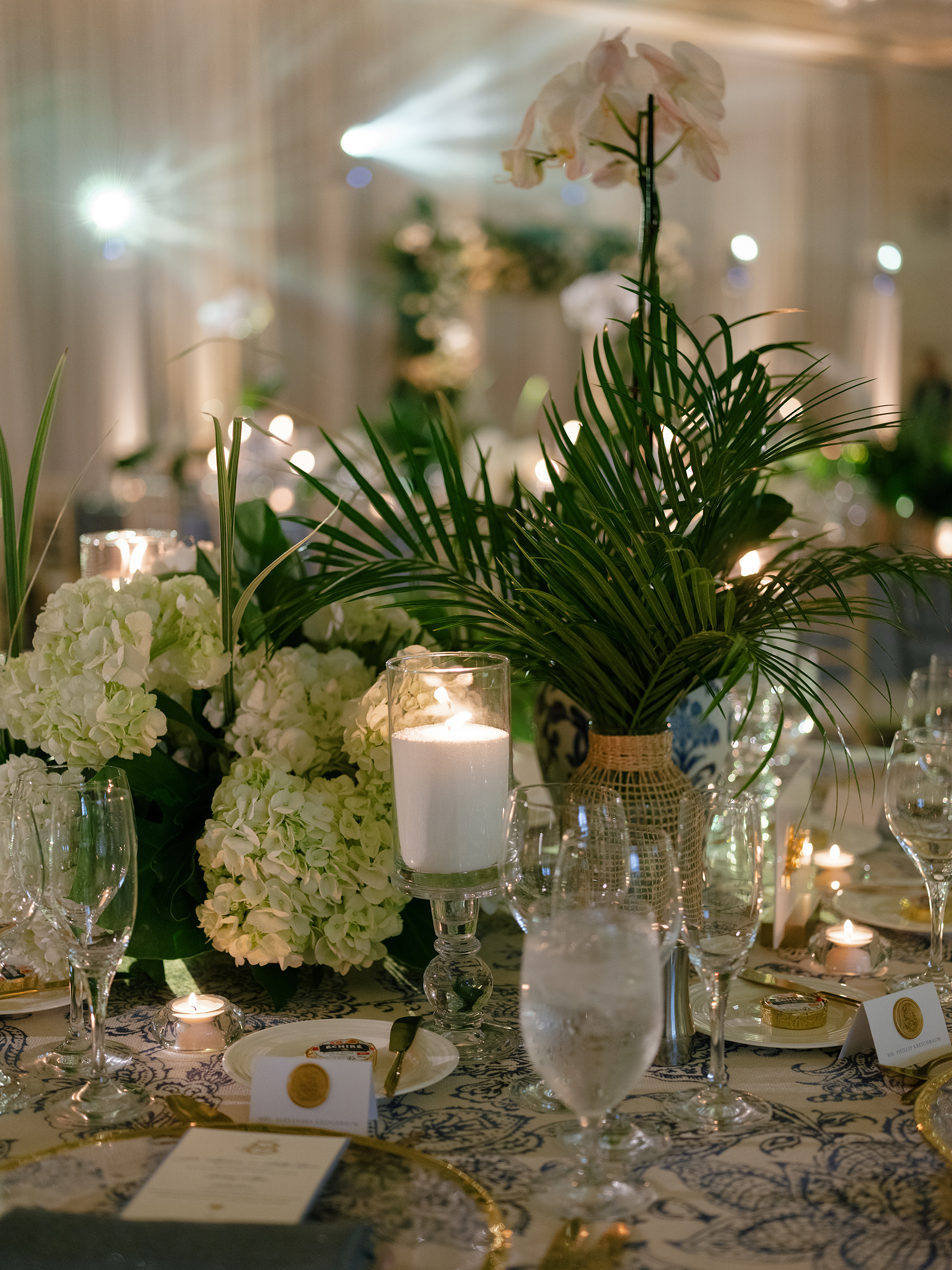 tropical and elegant tablescape details at wedding reception