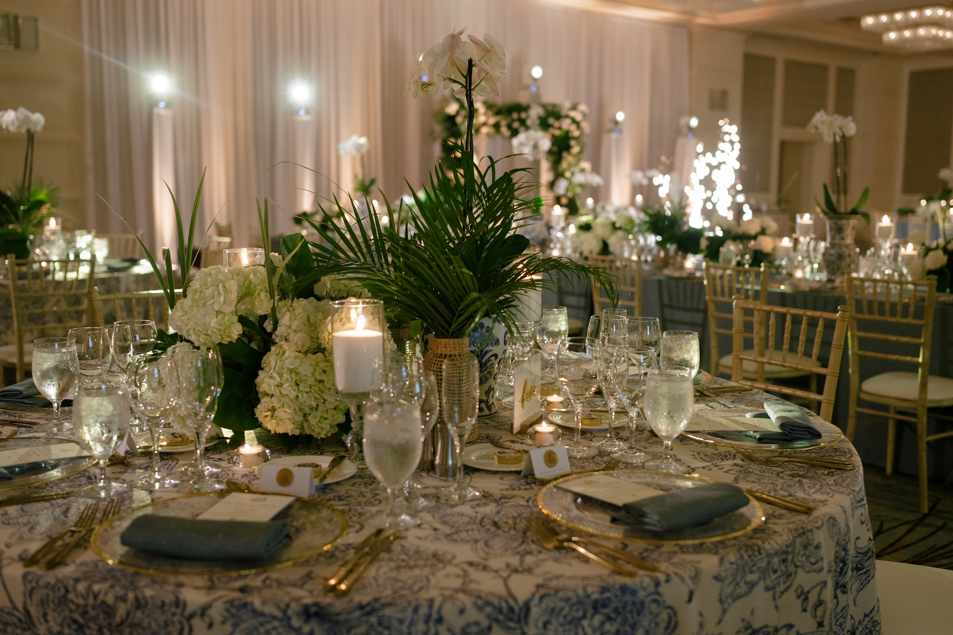 tropical and elegant tablescape details at wedding reception