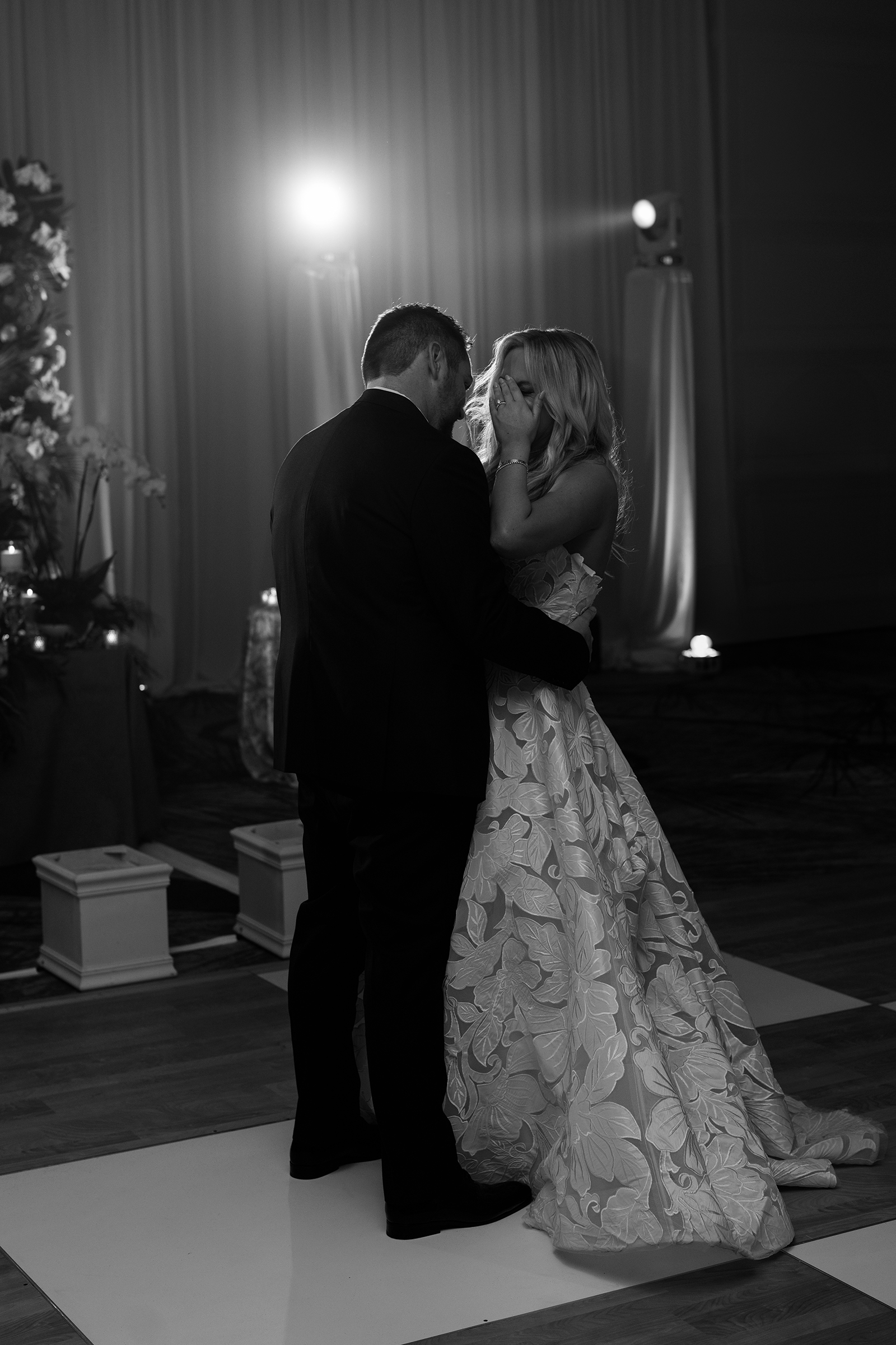 black and white picture of bride and groom's first dance