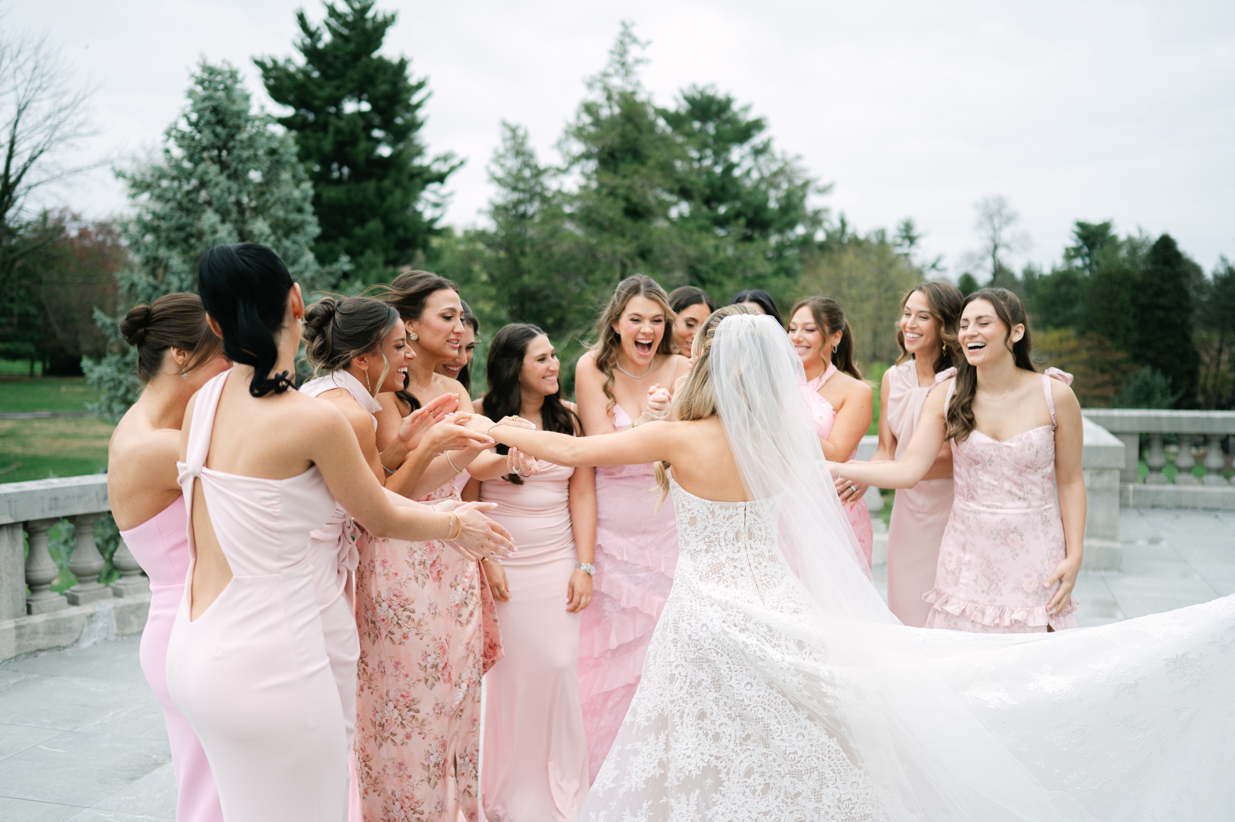 bride's first look with bridesmaids