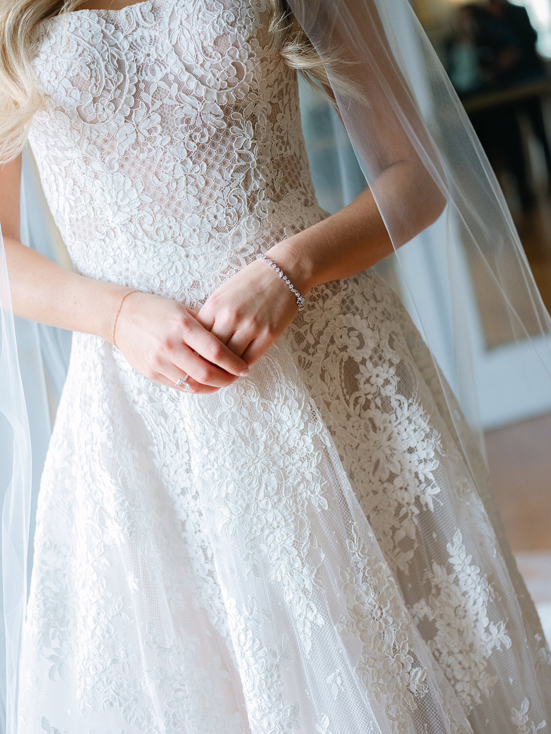 close-up of bride with corset lace top dress