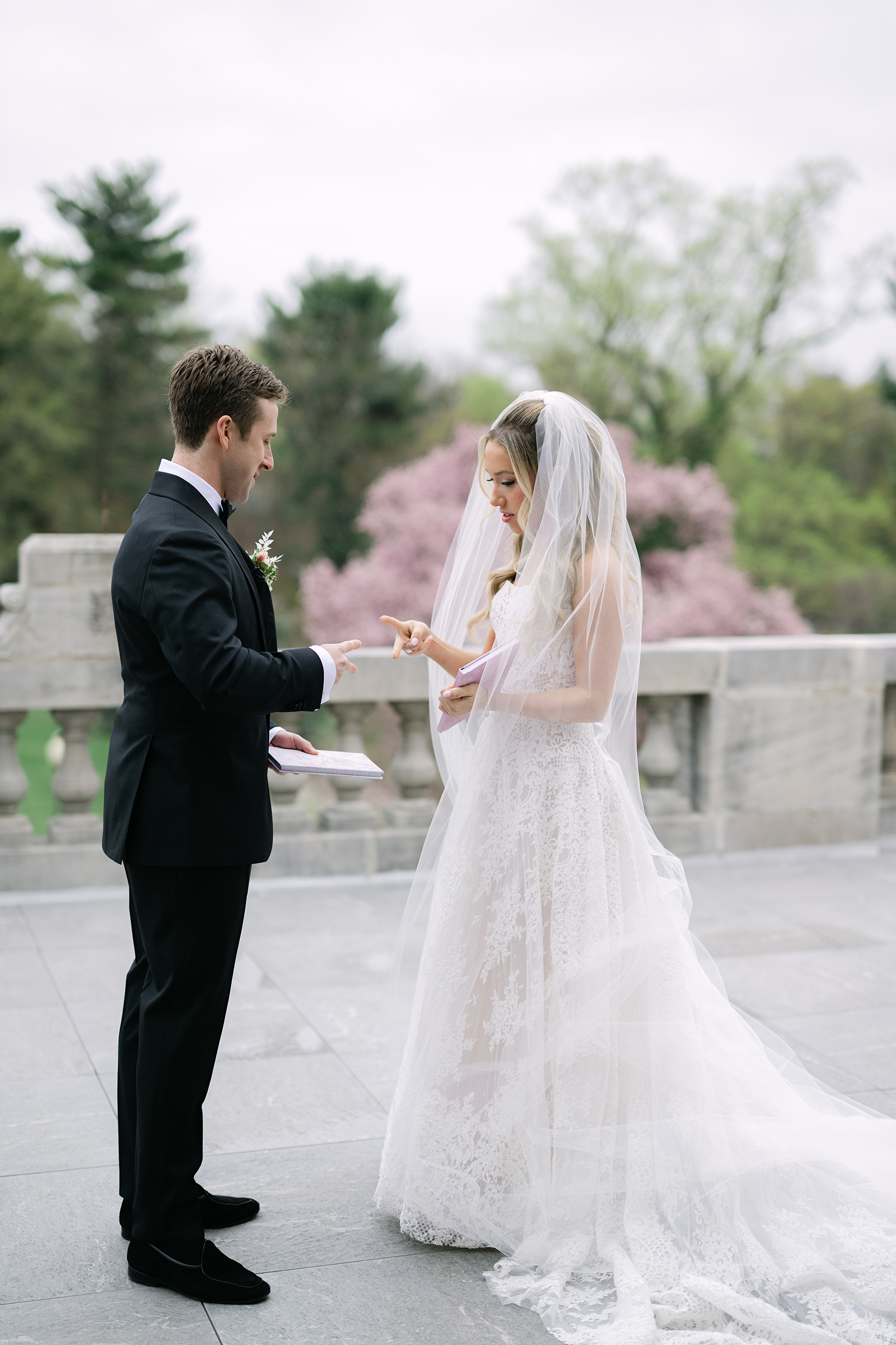 bride and groom saying wedding vows during first look