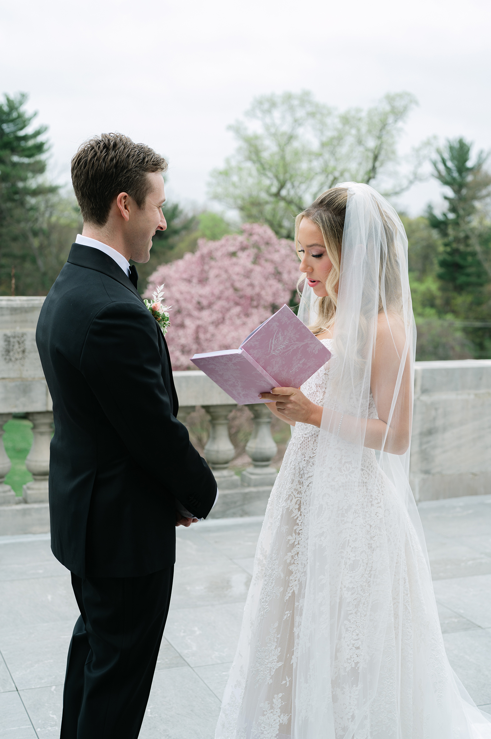 bride and groom saying wedding vows during first look