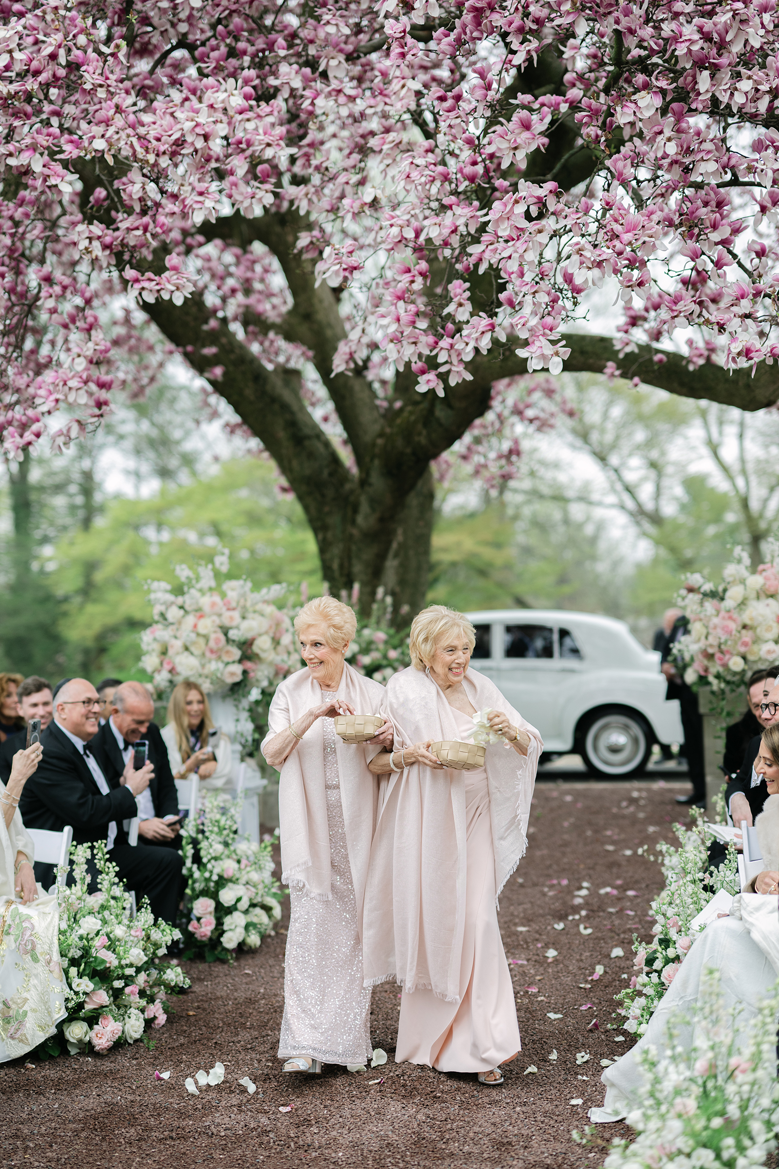 grandmothers as flower girls for wedding ceremony