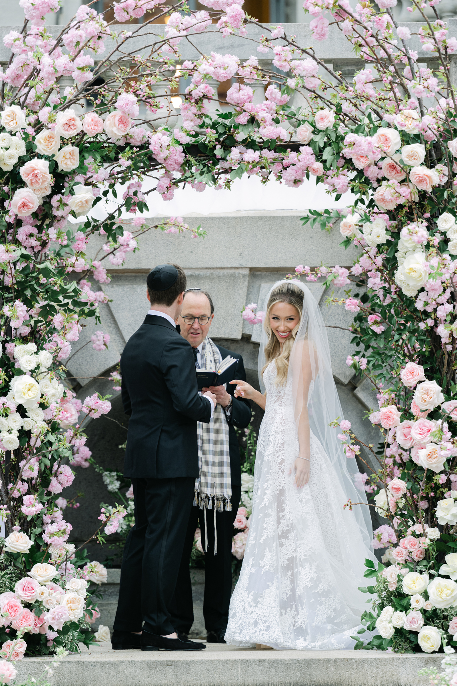 bride and groom at wedding ceremony altar