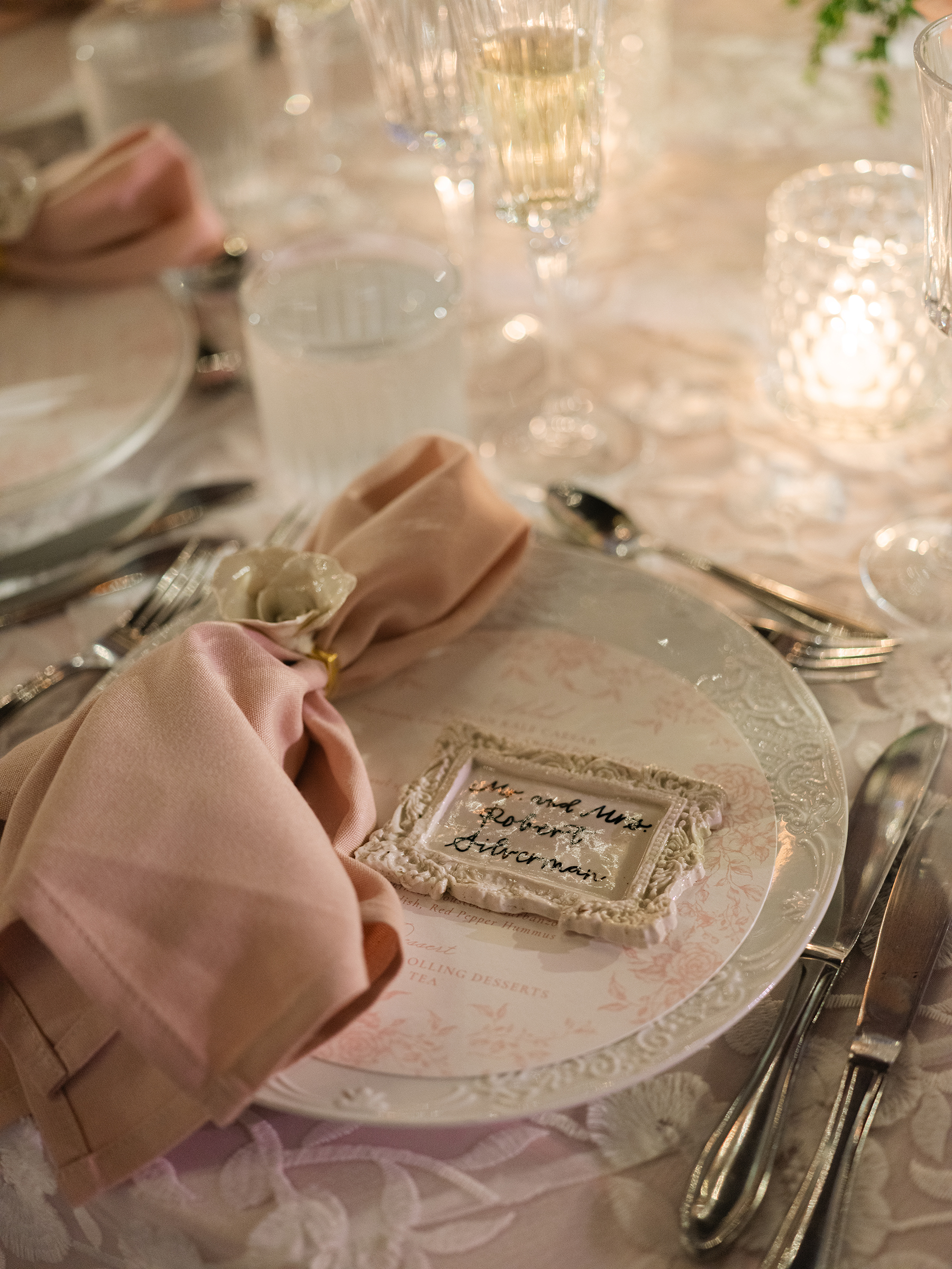 pink and white wedding reception decor with gold accents