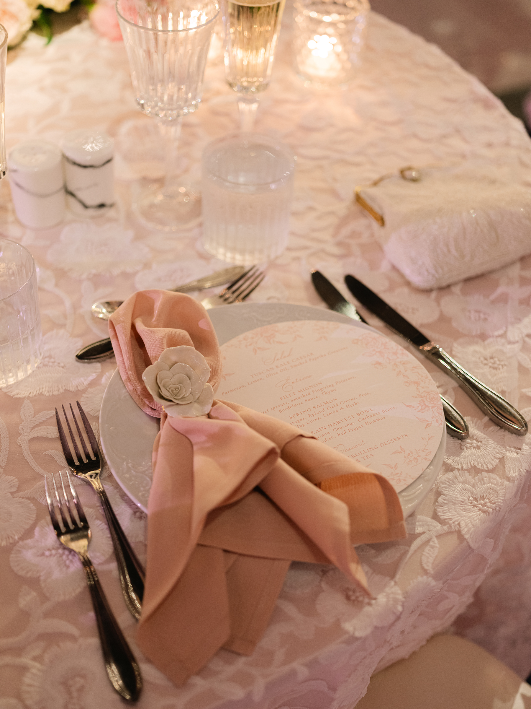 pink and white wedding reception decor with gold accents