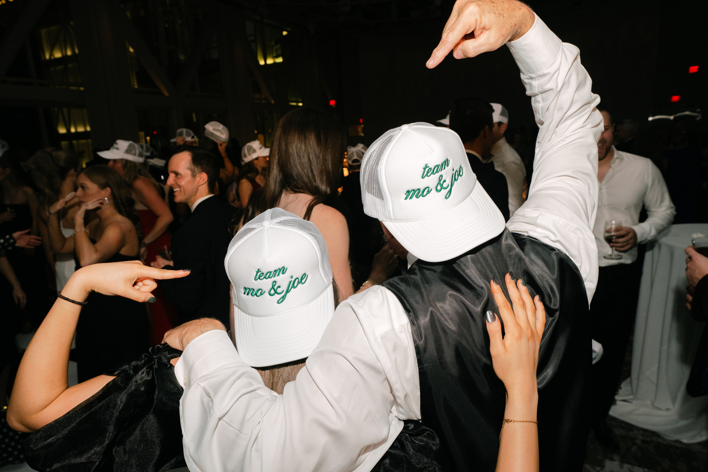 bride and groom with matching hats
