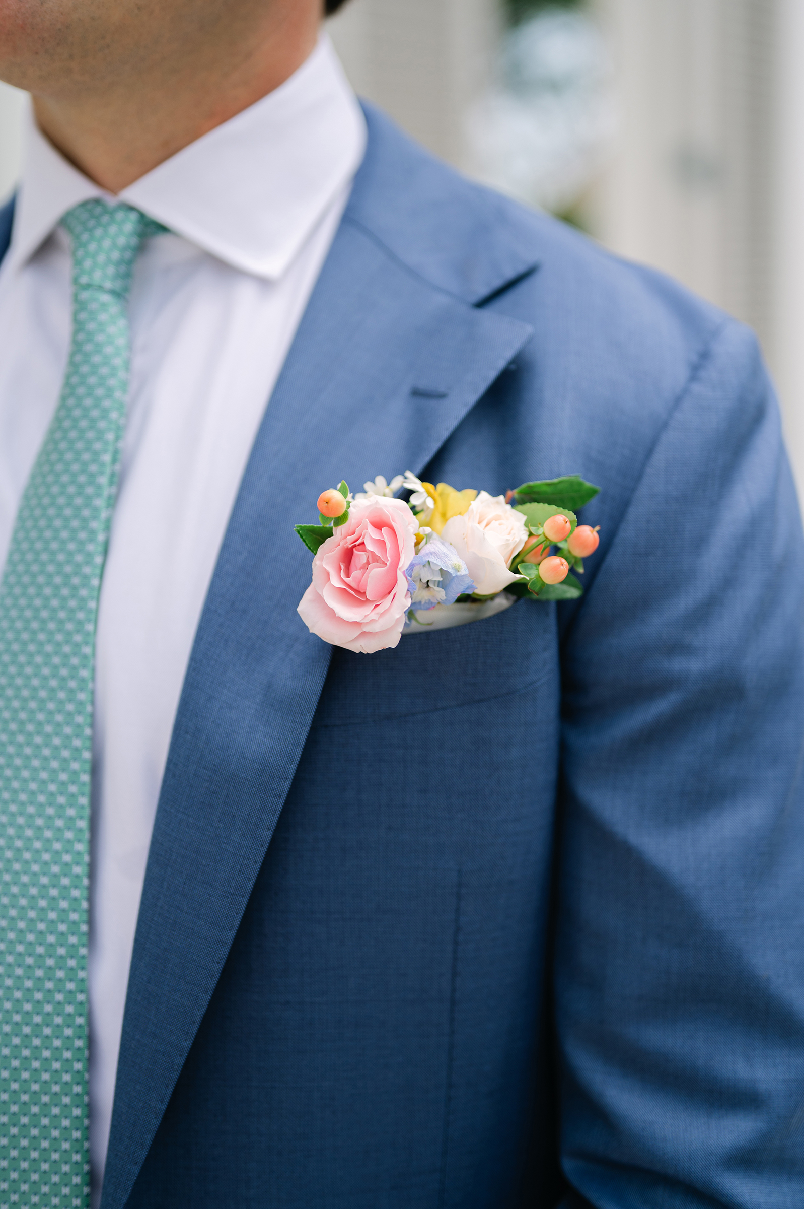 close-up of groom's tux