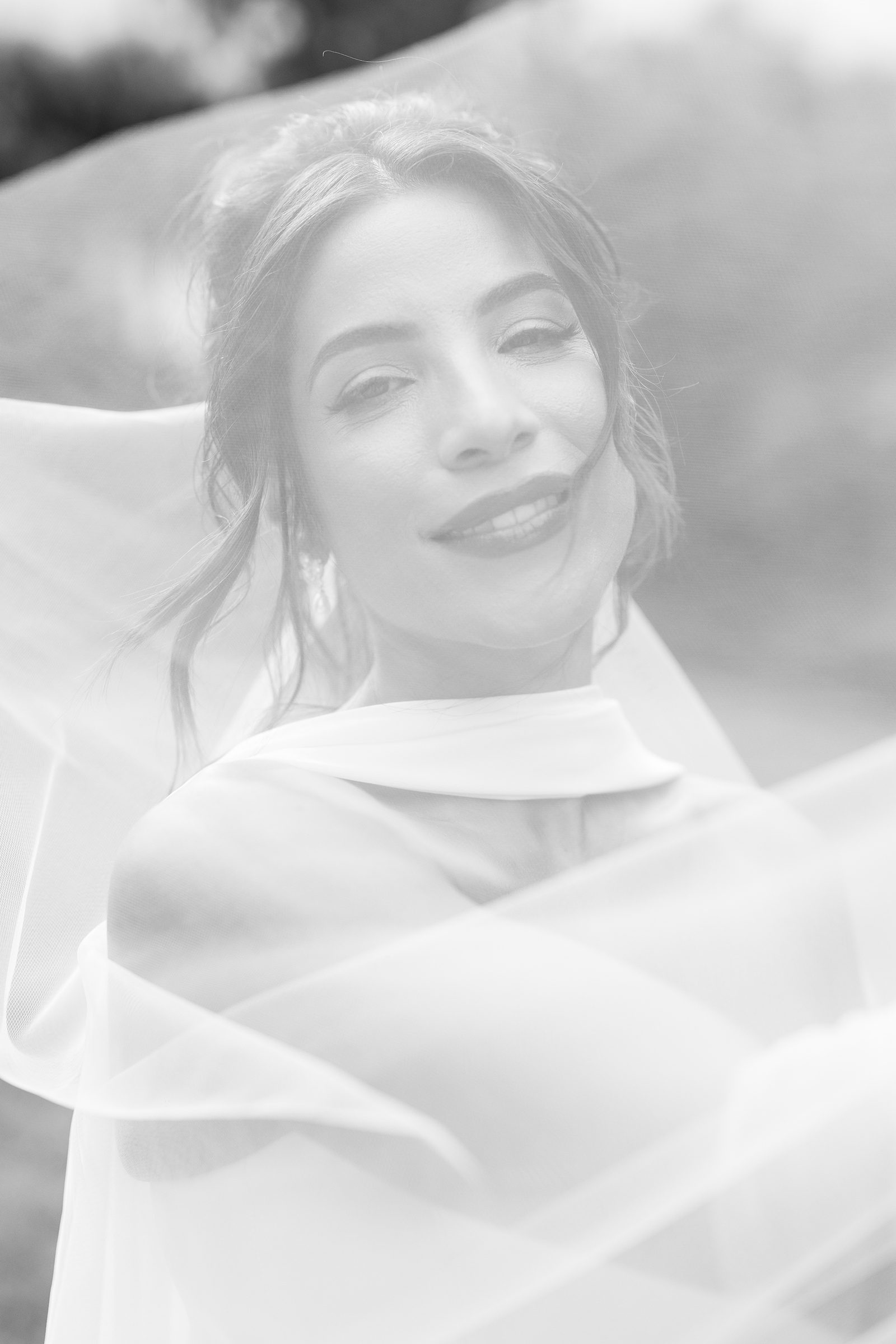 black and white picture of bride in wedding dress