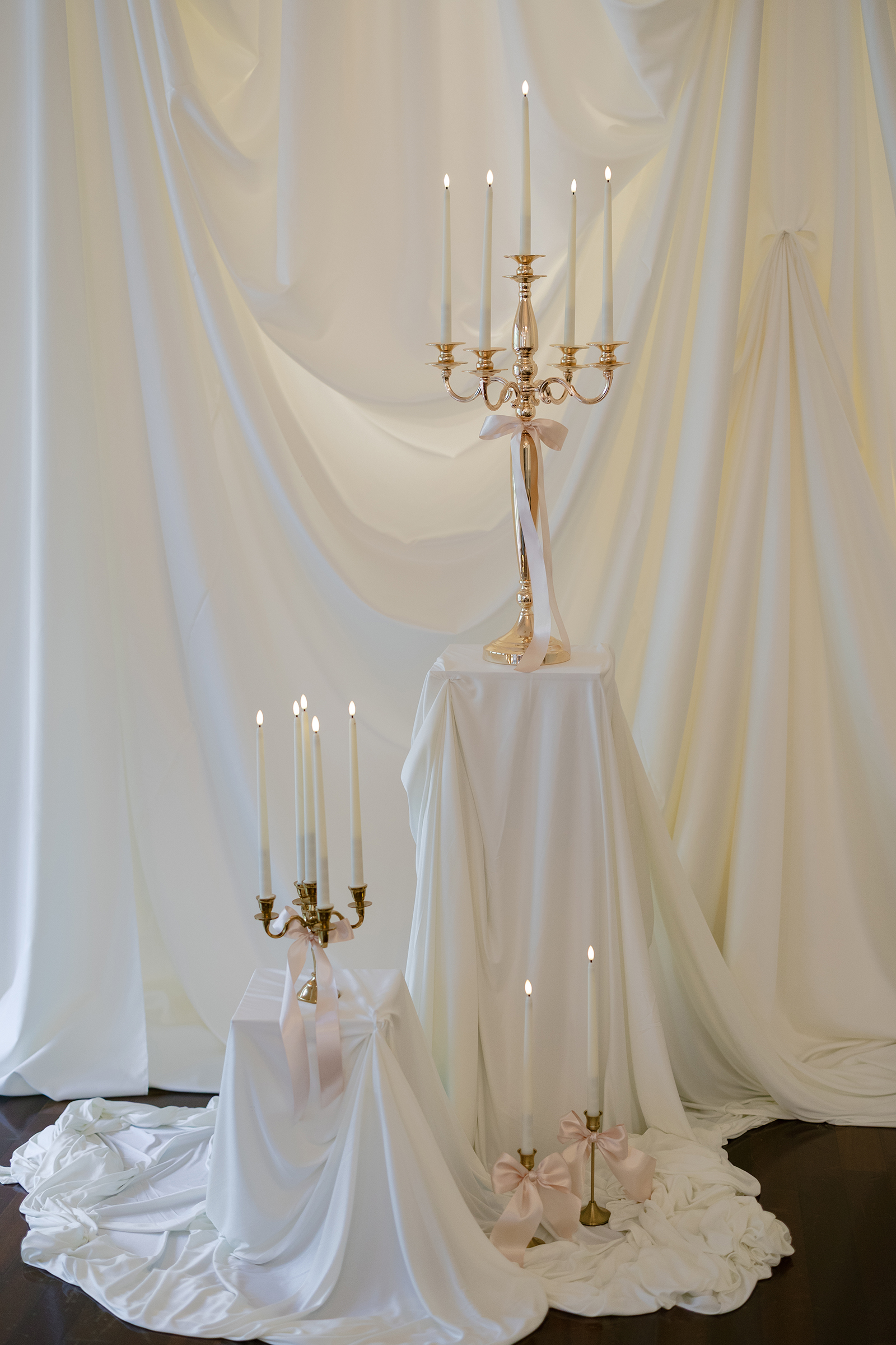 ceremony decor with linen drapings and candles
