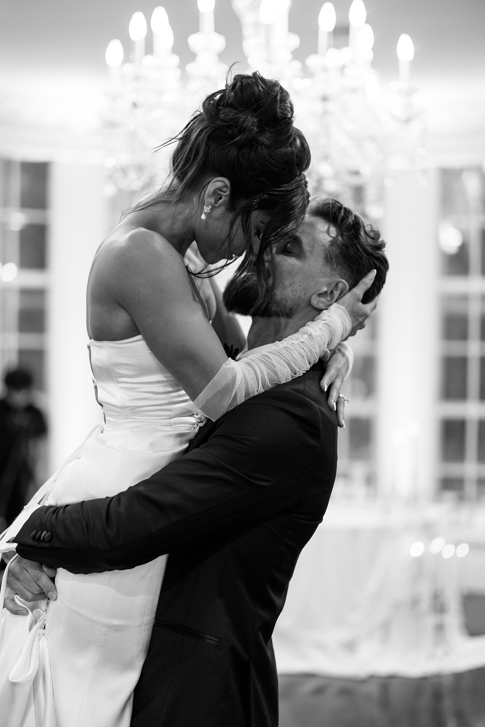 black and white picture of bride and groom's first dance