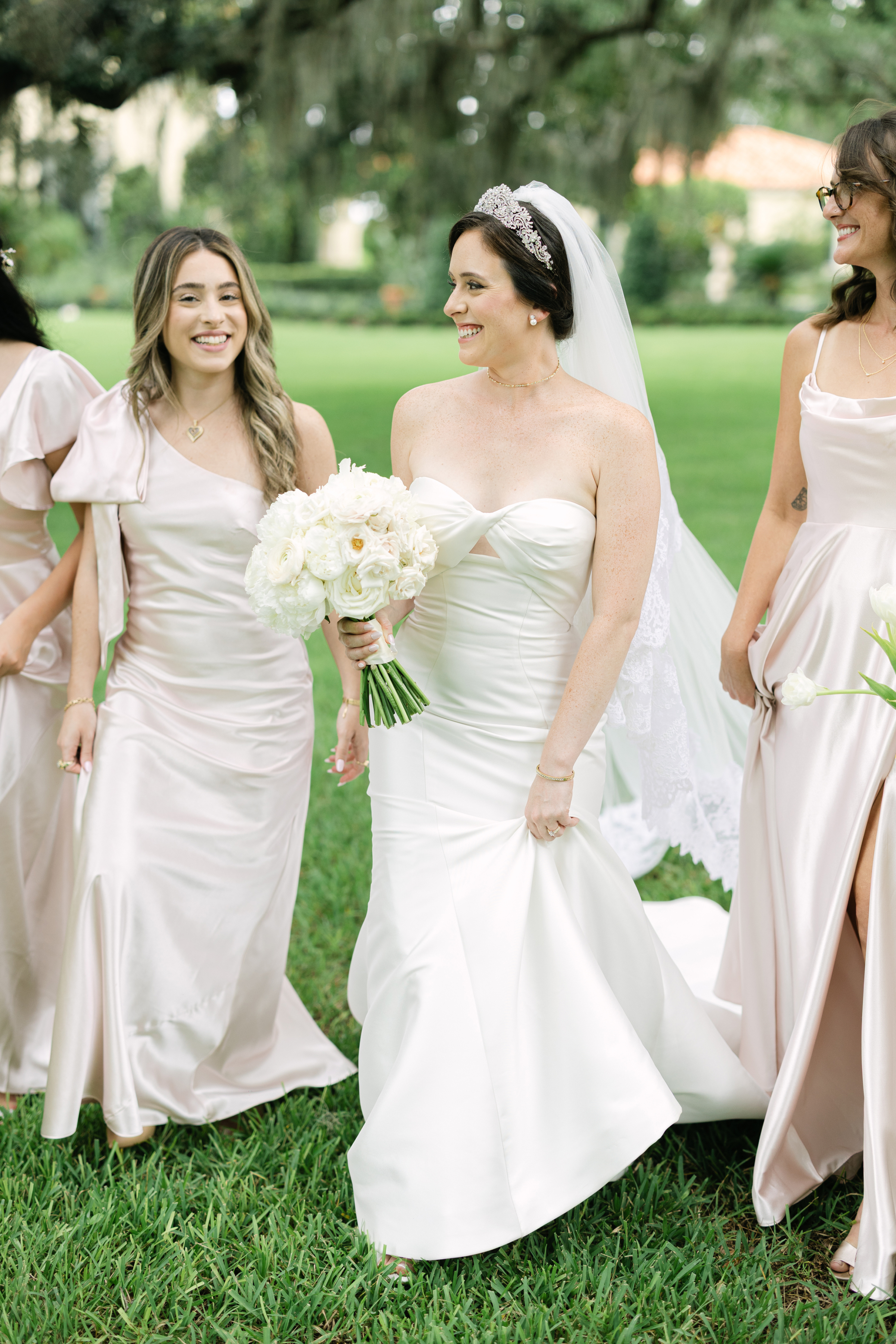 classy and traditional bride with blush pink bridesmaids