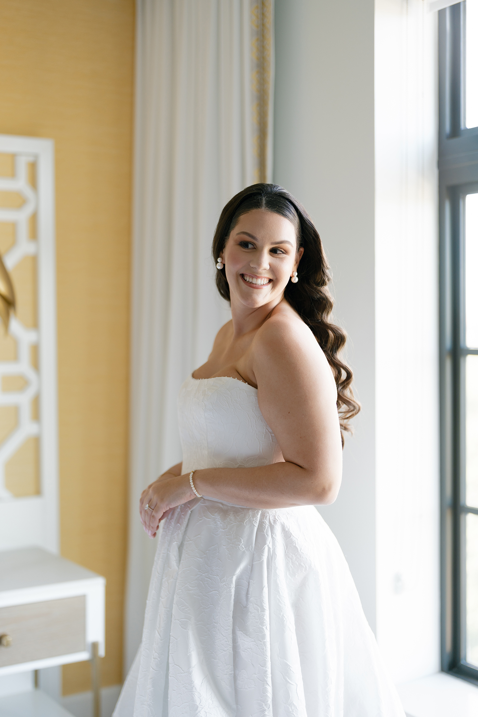 bride wearing strapless ball gown wedding dress