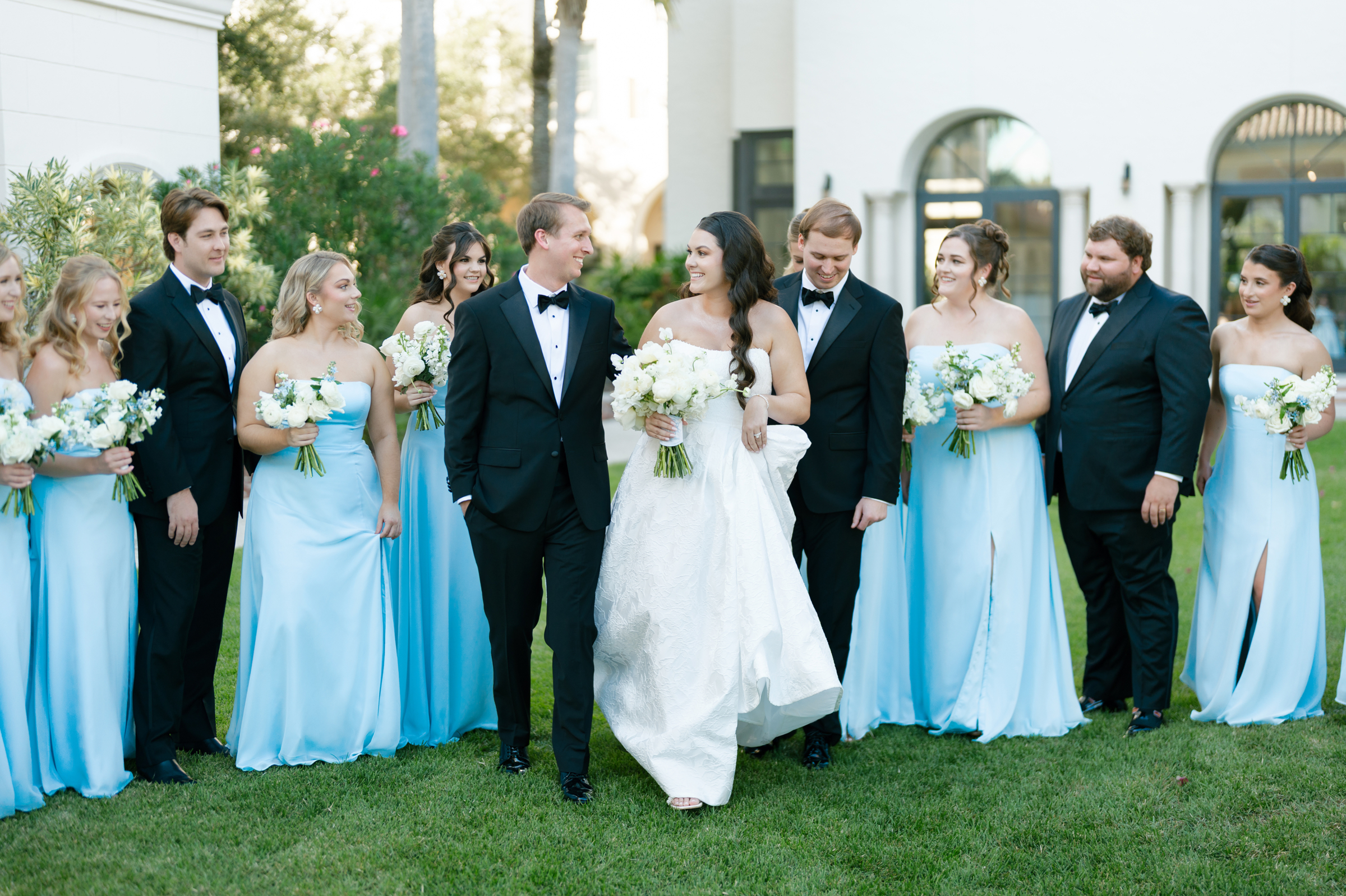 bride and groom with wedding party