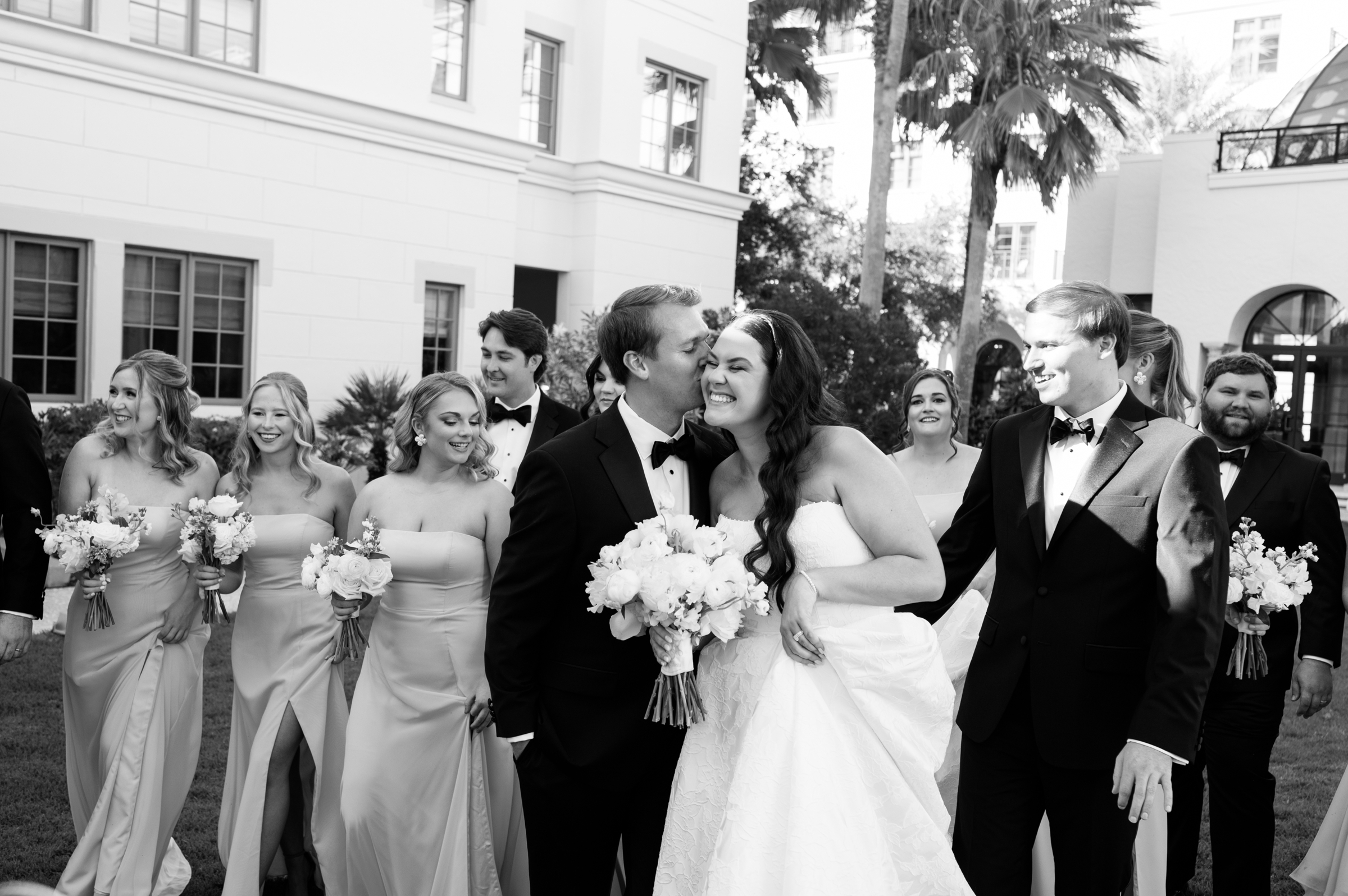 bride and groom with wedding party