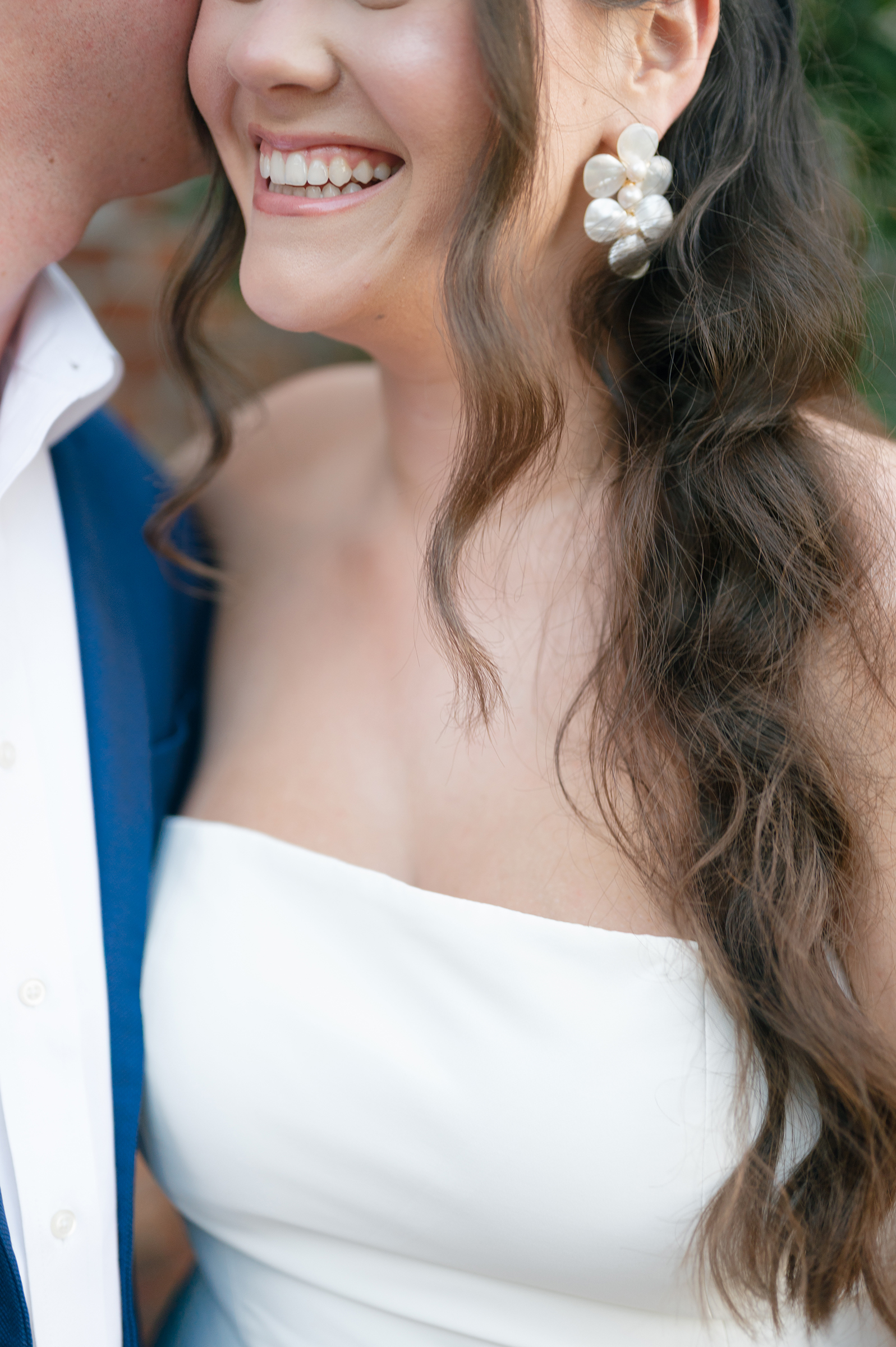 close-up details of bride's jewelry