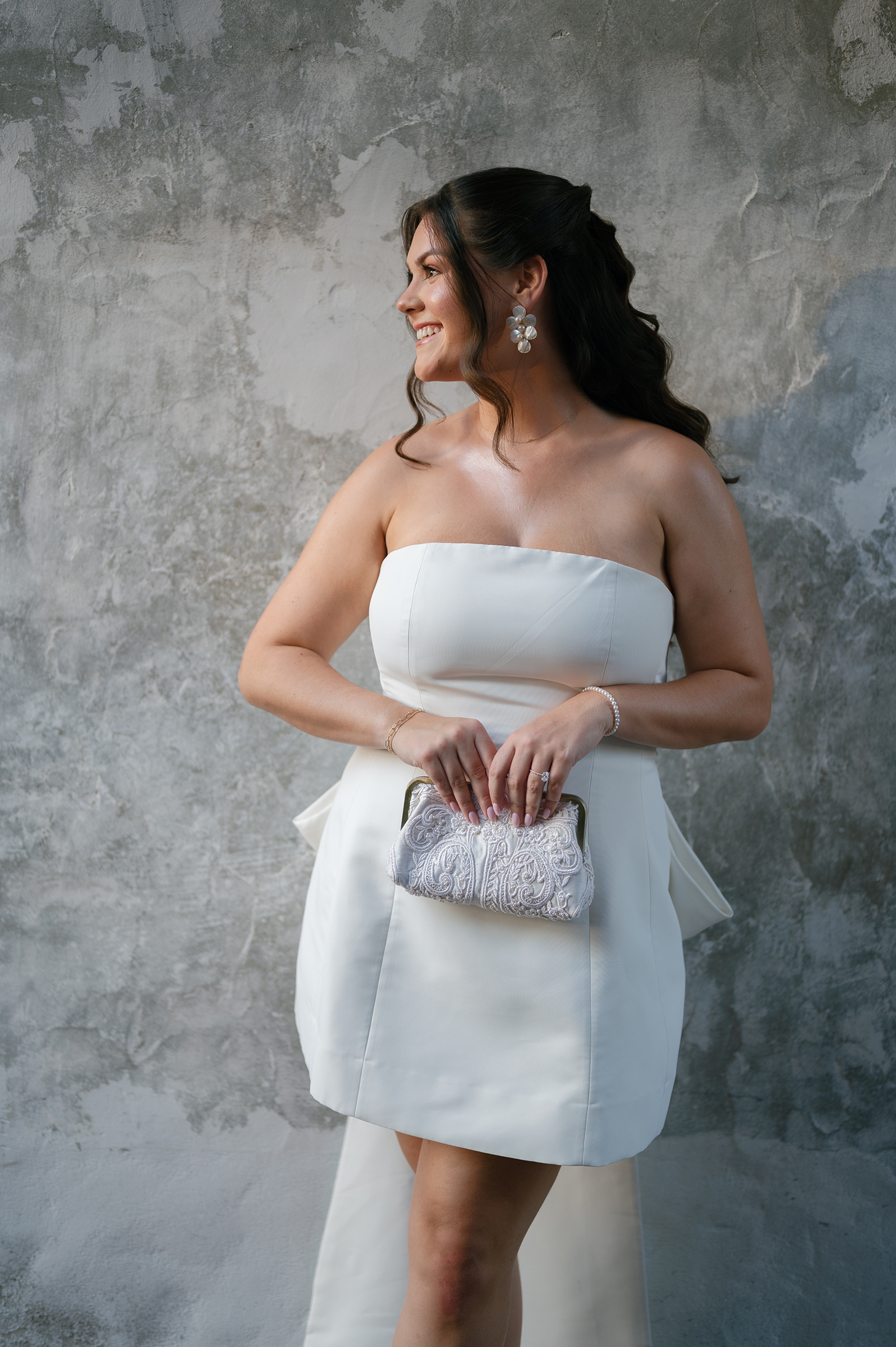 mini dress with bow detail and sequin bag