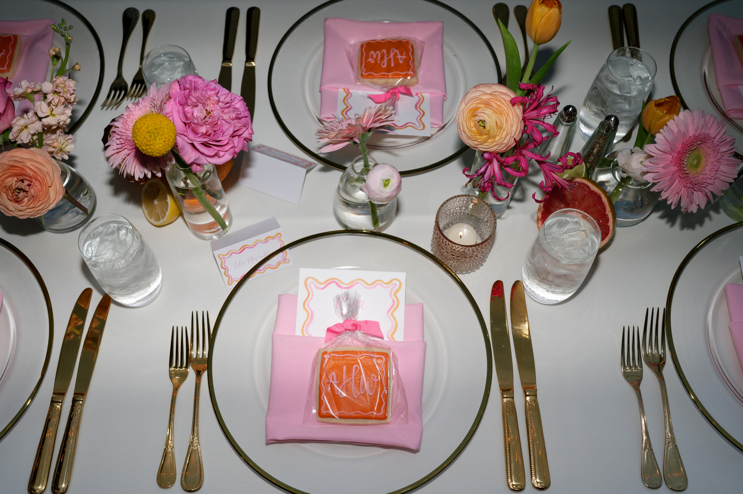 pink and orange personalized stationery and wedding favors