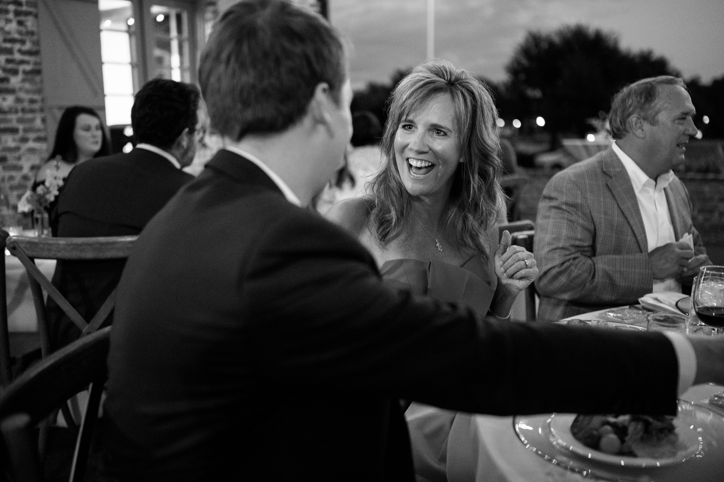 black-and-white picture of groom and guests