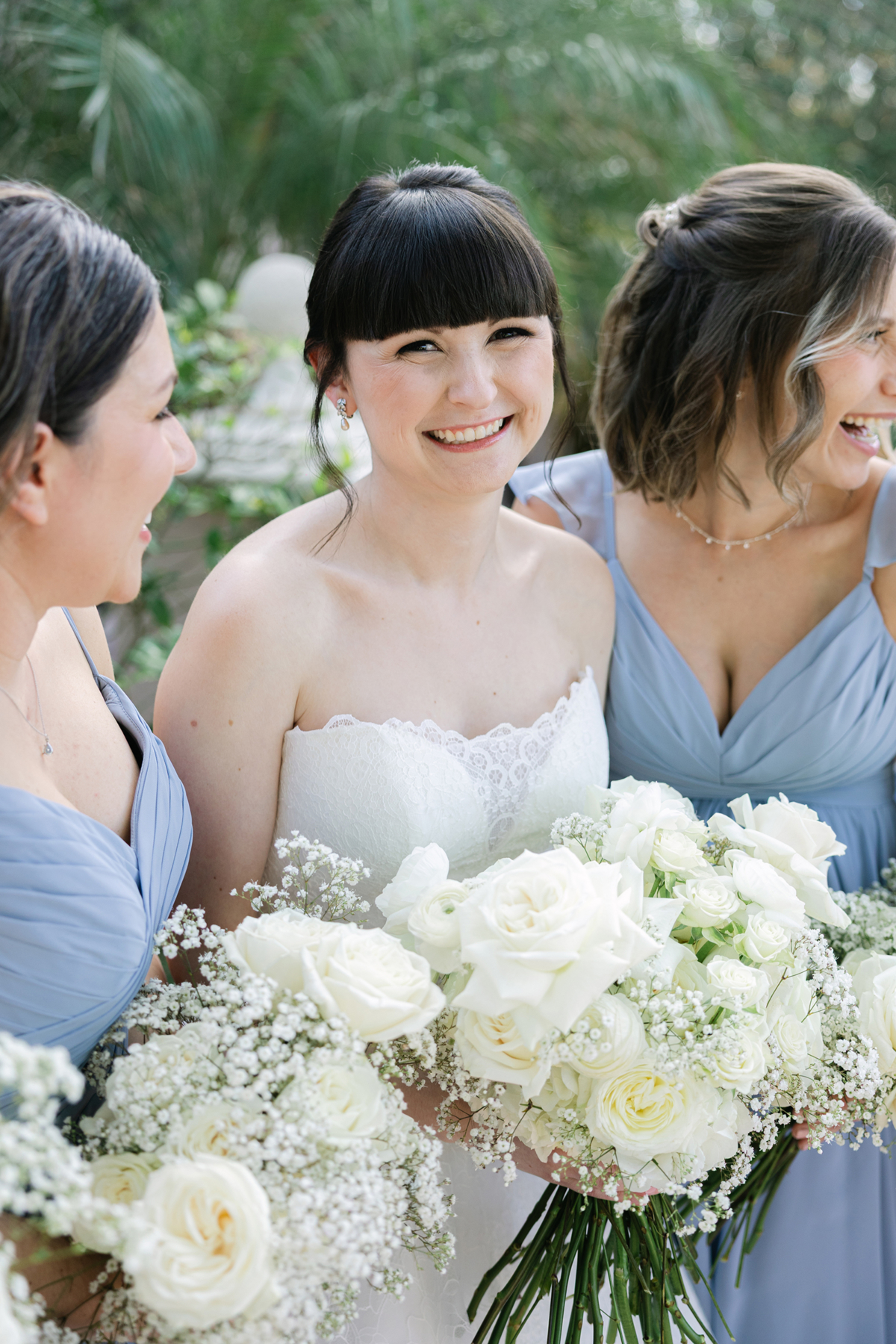 Bride laughing with bridesmaids at Isleworth Country Club wedding