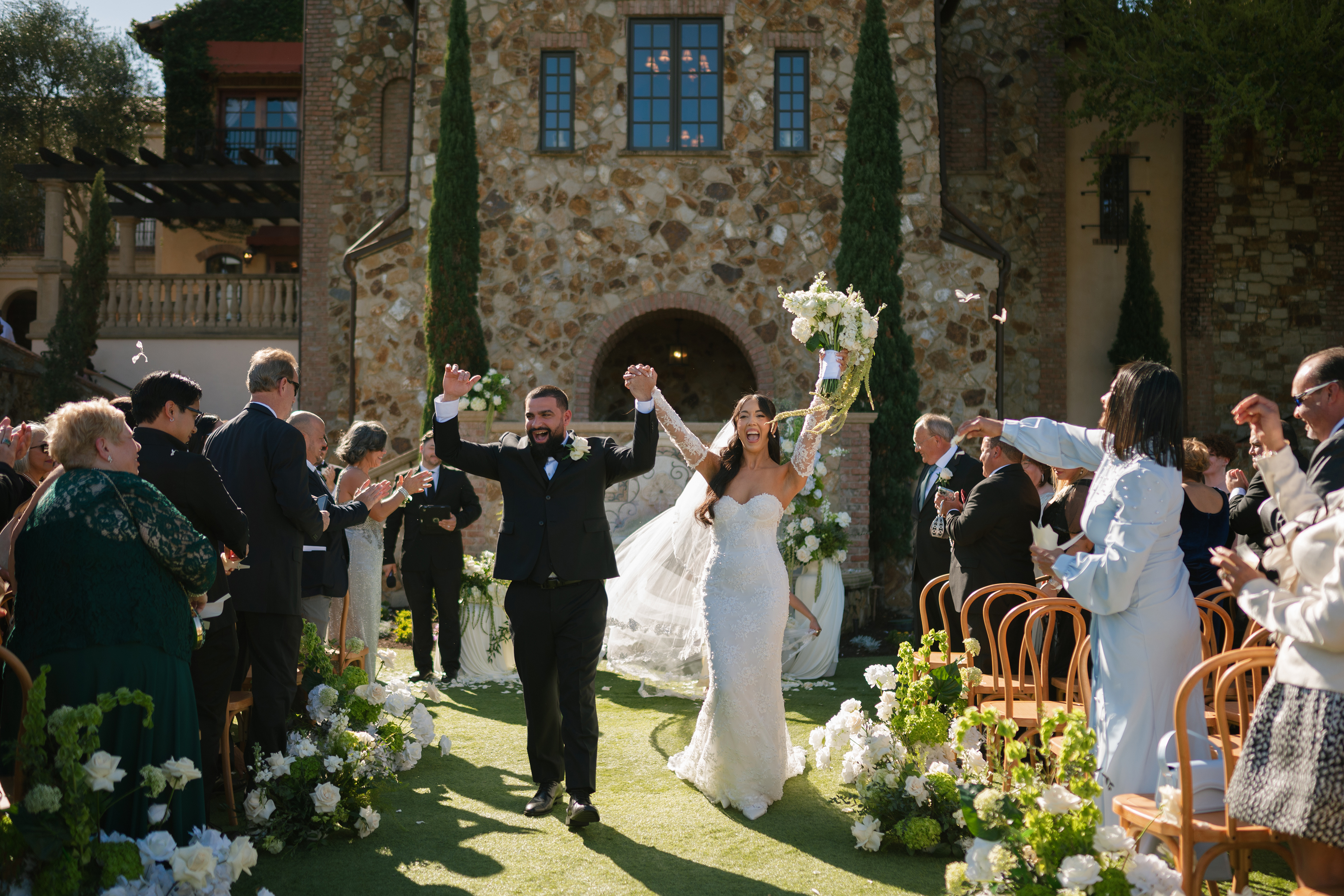 outdoor Bella Collina wedding ceremony Orlando Florida with elegant floral aisle decor
