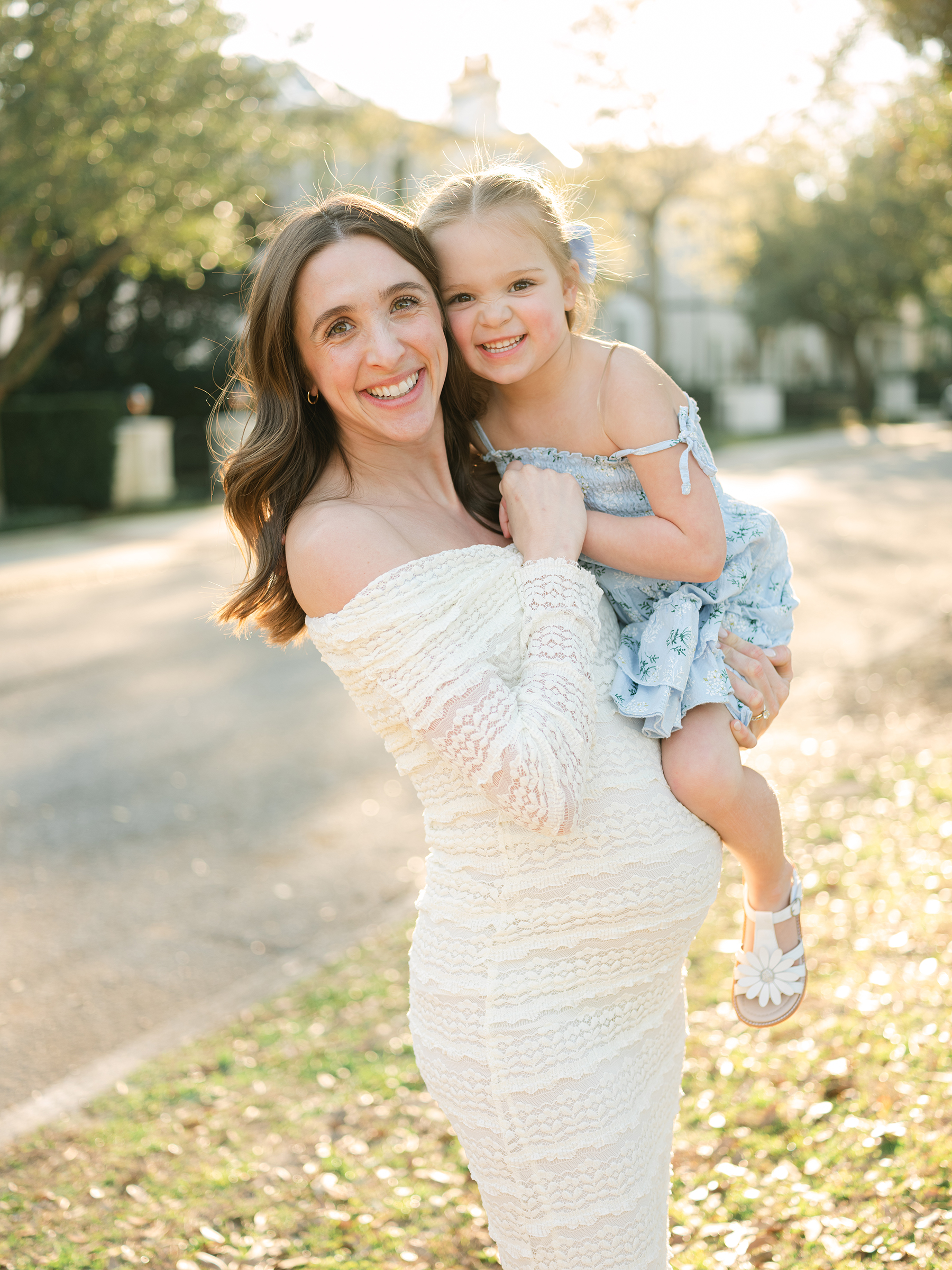 sunlit and bright maternity photo with daughter