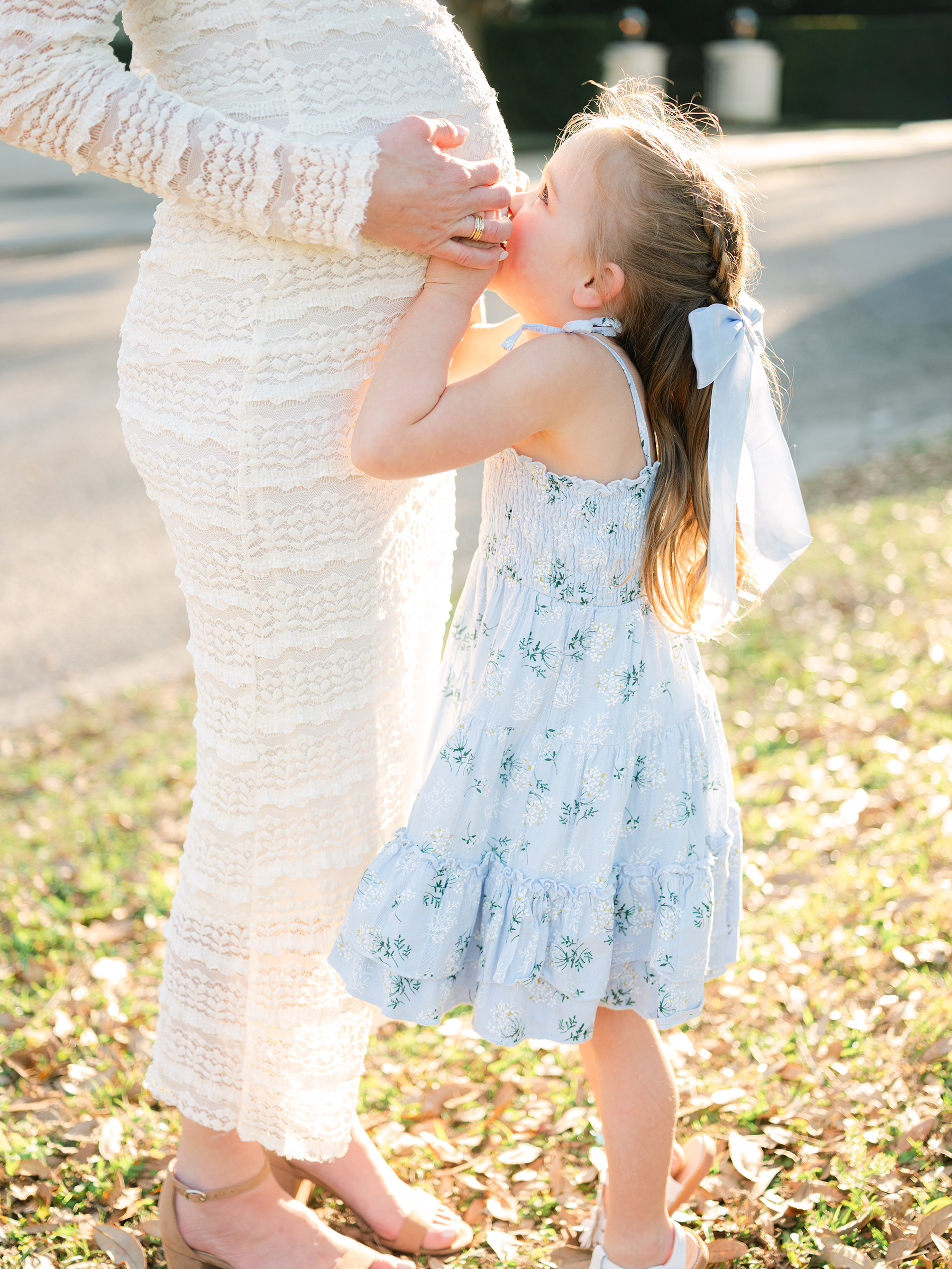 sunlit and bright maternity photo with daughter