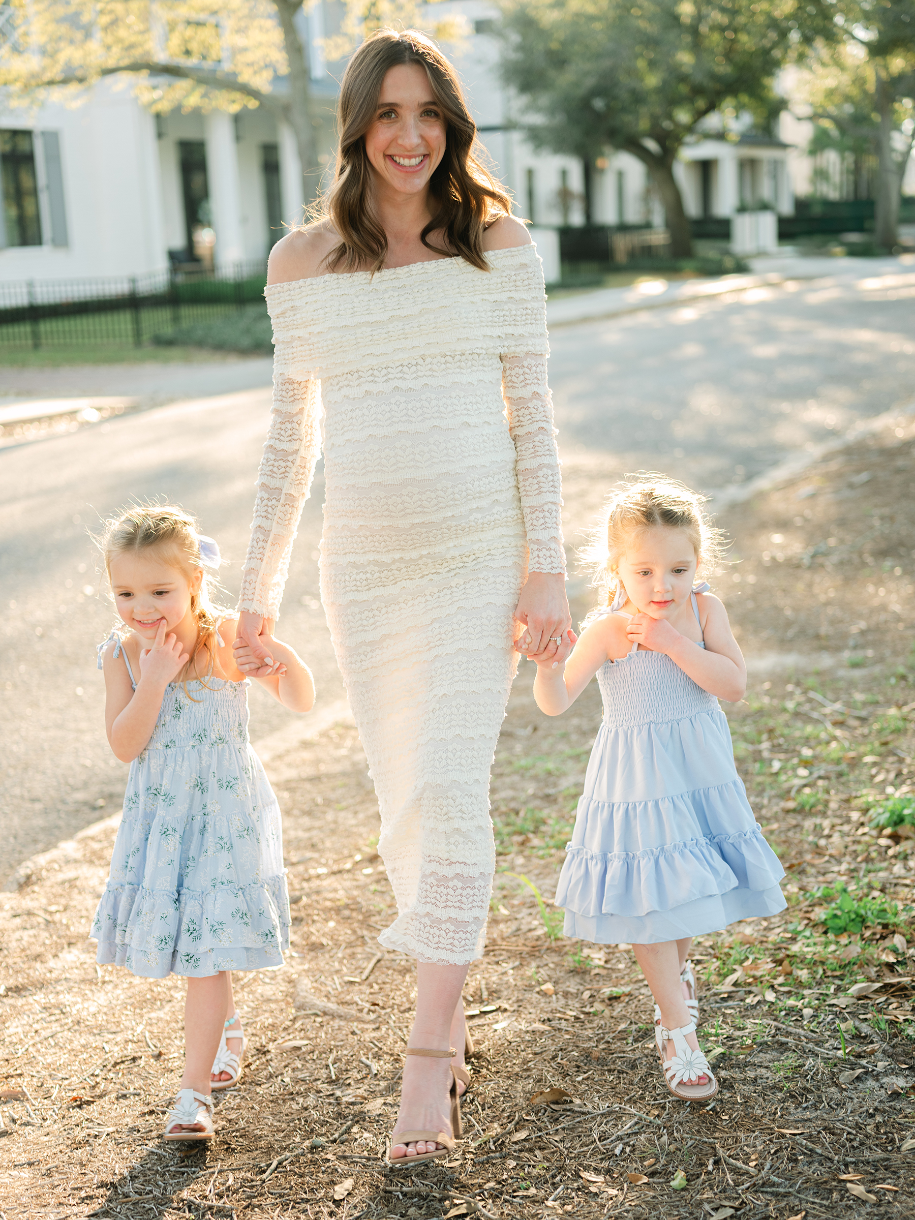sunlit and bright maternity photo with daughters